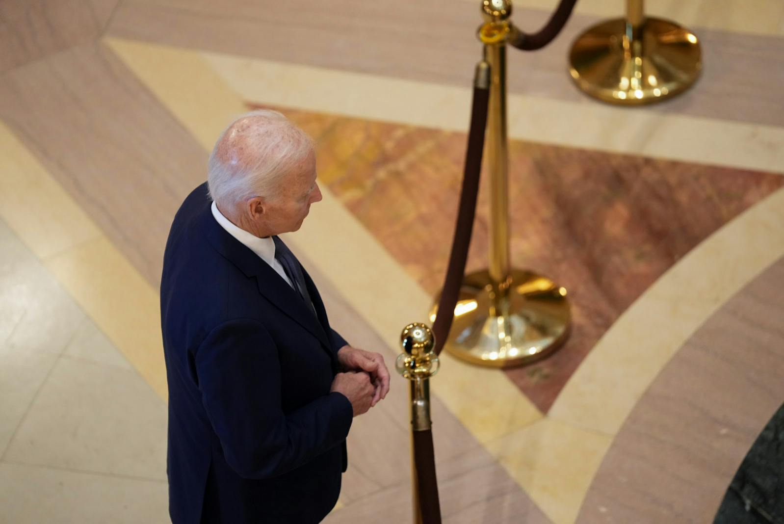 Former President Joe Biden visits the caskets of Minnesota State Rep. Melissa Hortman, Mark Hortman and their dog, Gilbert, at the Minnesota State Capitol in St. Paul.