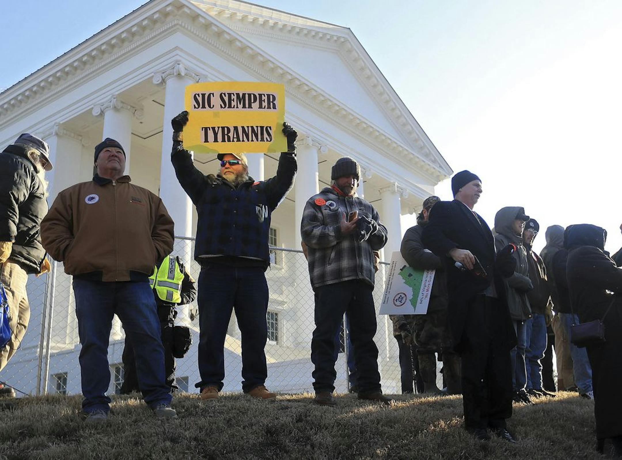 Gun-rights supporters gather on Bank near the state Capitol in Richmond, Va., Monday morning Jan. 20, 2020. Gun-rights activists and other groups are descending on Virginia's capital city of Richmond to protest plans by the state's Democratic leadership to pass gun-control legislation.