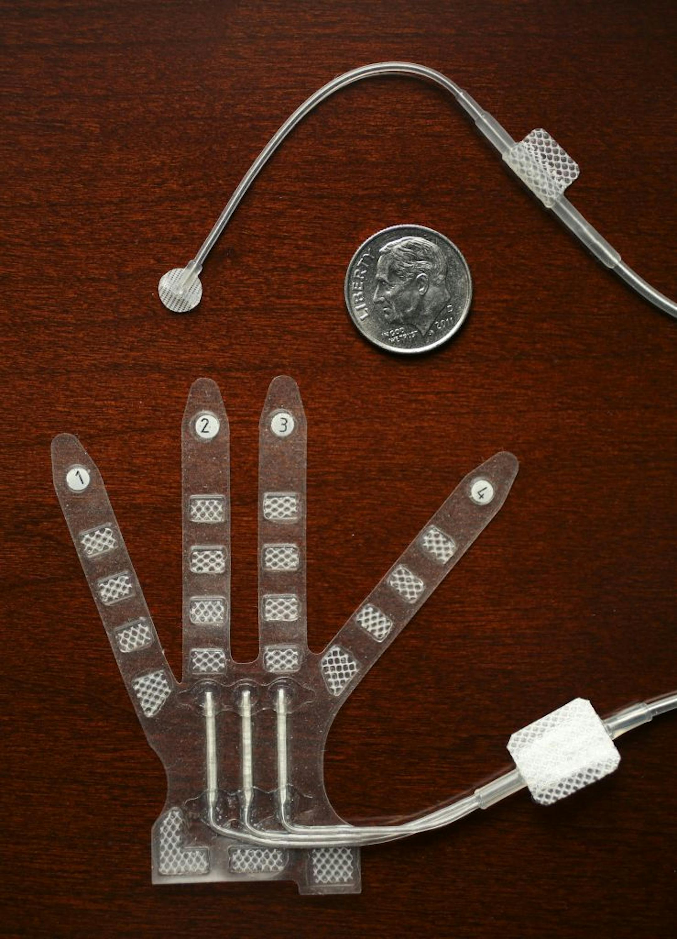 Medical device maker CVRx has won FDA and European approval for a large trial to test its implantable Barostim neo device's ability to treat dangerously high blood pressure and heart failure. CVRx first generation, below, and second generation leads for their Barostim neo device, photographed at the company headquarters in Brooklyn Park, Minn. Tuesday afternoon, November 20, 2012.