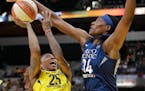 Indiana Fever's Cappie Pondexter (25) is fouled by Minnesota Lynx's Sylvia Fowles during the second half Wednesday.