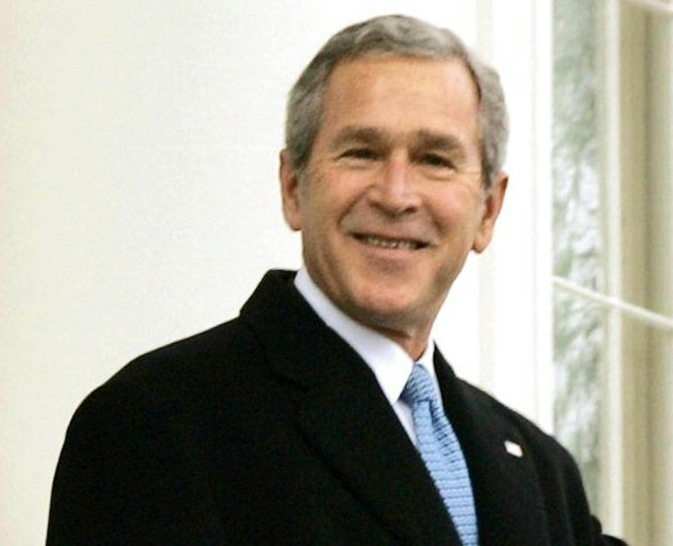 President George W. Bush and first lady Laura Bush depart the North Portico of the White House for the limousine ride to the Capitol where he will take the Oath of Office and begin his second term, in Washington, Thursday, Jan. 20, 2005. They are joined by their daughters Barbara, far left, and Jenna. (AP Photo/J. Scott Applewhite)