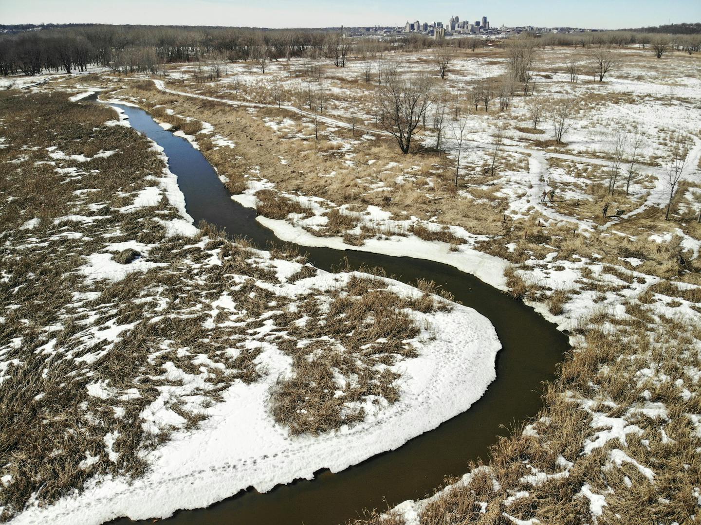 Battle Creek flows through the site with St. Paul in the background. Barrels of toxic waste and leaking batteries once dotted the landscape around Pig's Eye Lake, which is the largest dump left from the days before regulated landfills. Cleaning up the Superfund site has been a slow process, but regulators are now leaning on the Met Council to address soils believed to be contaminated with metals from incinerated wastewater sludge. The Met Council is pushing back, saying it's not their responsibi