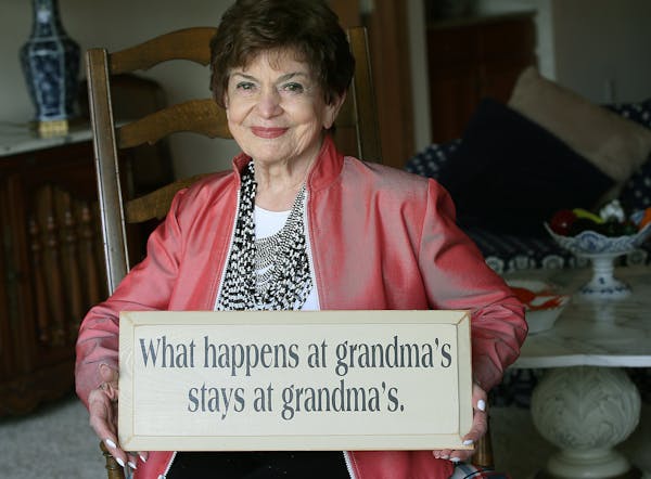 Gretta Freeman, 85, held one of her favorite signs inside her home, Friday, October 17, 2014 in St. Louis Park, MN. ] (ELIZABETH FLORES/STAR TRIBUNE) 