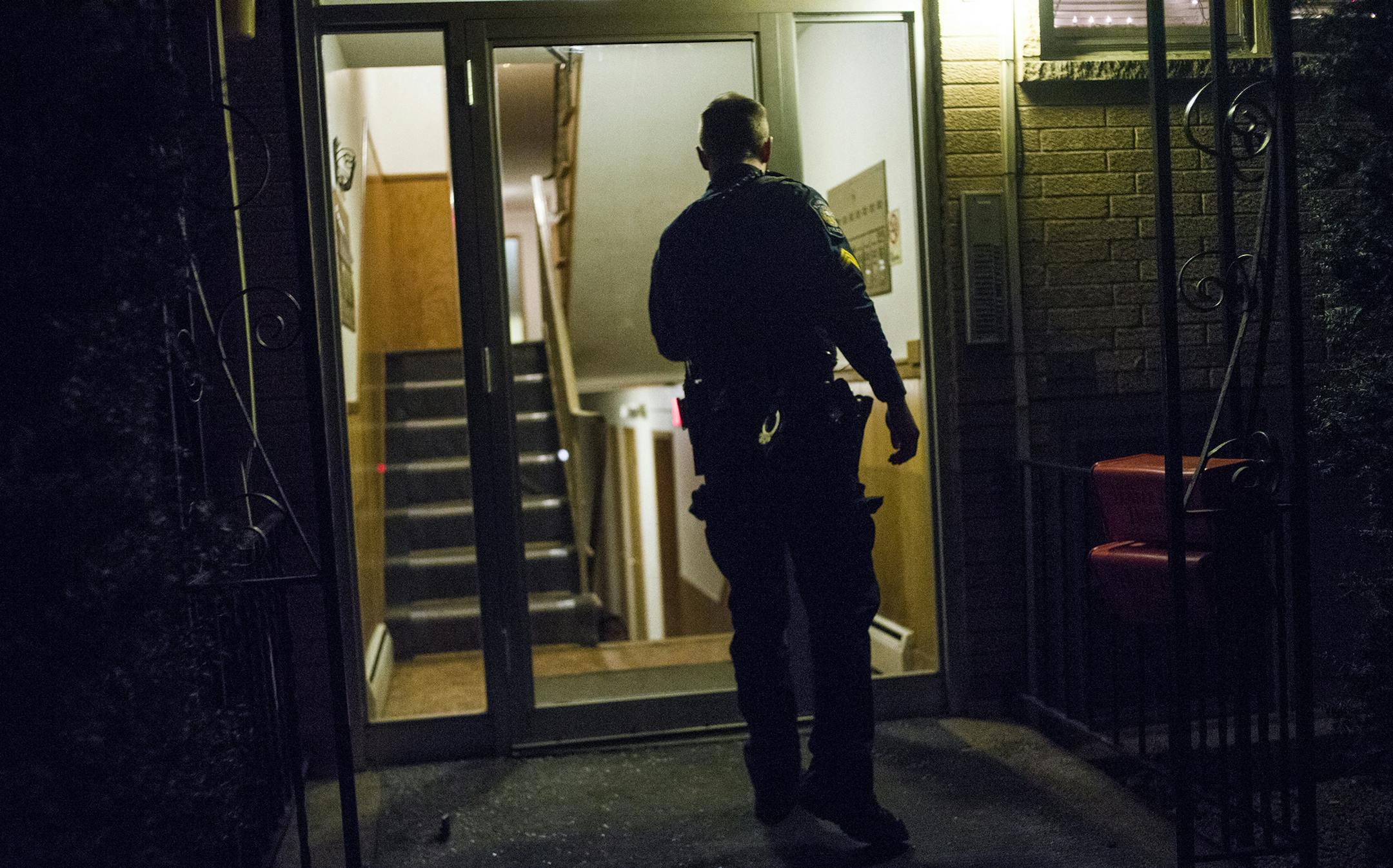 Sgt. Joe Adams of the Roseville Police drives his patrol car on a 6PM to 6AM shift.He found himself in an intractable position of having to neutralize Wayne Malone when he brandished a fake gun outside his apartment in this building.] Richard Tsong-Taatarii/rtsong-taatarii@startribune.com ORG XMIT: MIN1603230630286030