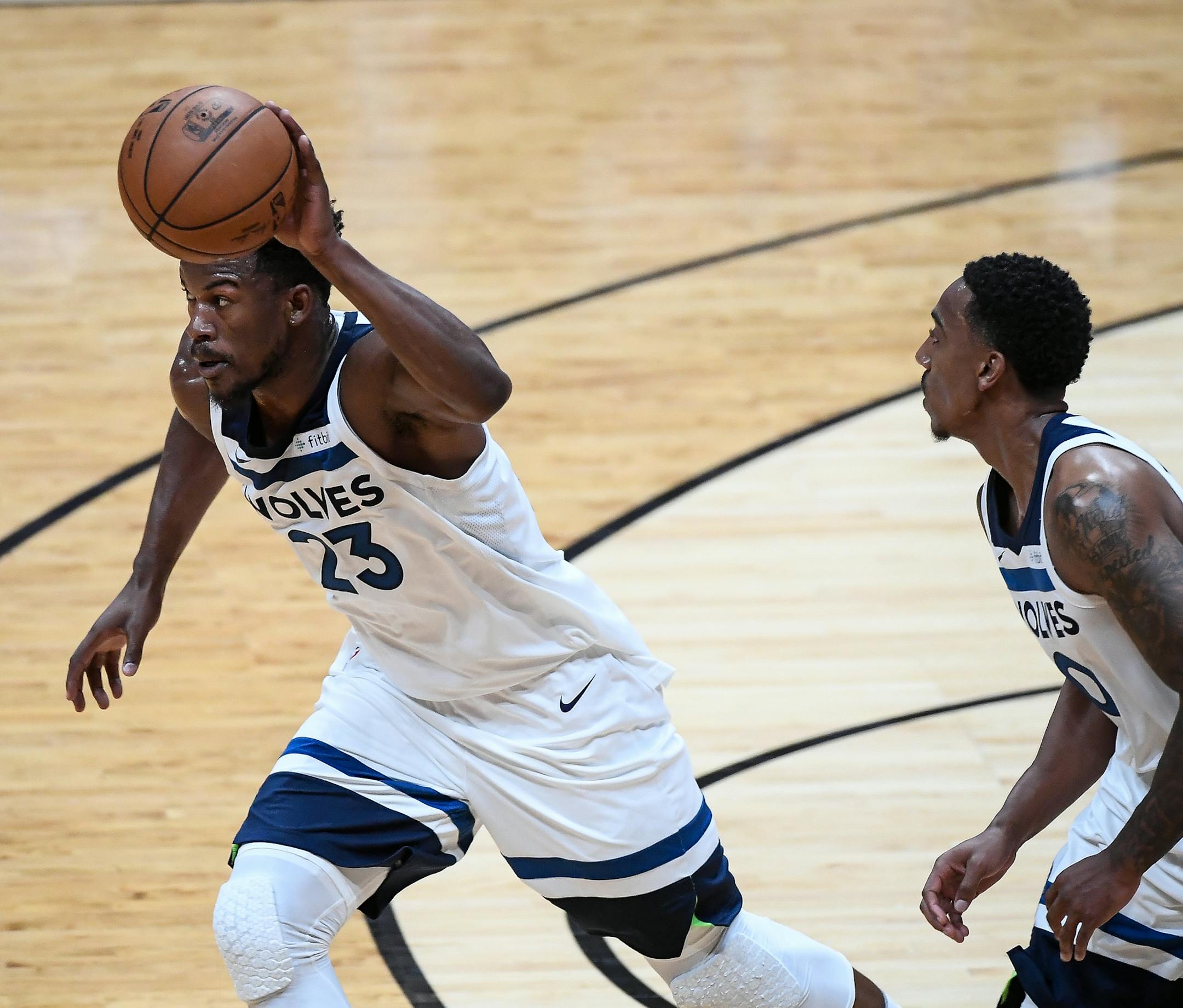 Minnesota Timberwolves guard Jimmy Butler (23) moved the ball down the court in front of fellow guard Jeff Teague (0) in the second quarter Saturday. ] AARON LAVINSKY ï aaron.lavinsky@startribune.com The Minnesota Timberwolves played the Los Angeles Lakers in their first game of the NBA preseason on Saturday, Sept. 30, 2017 at Honda Center in Anaheim, California.