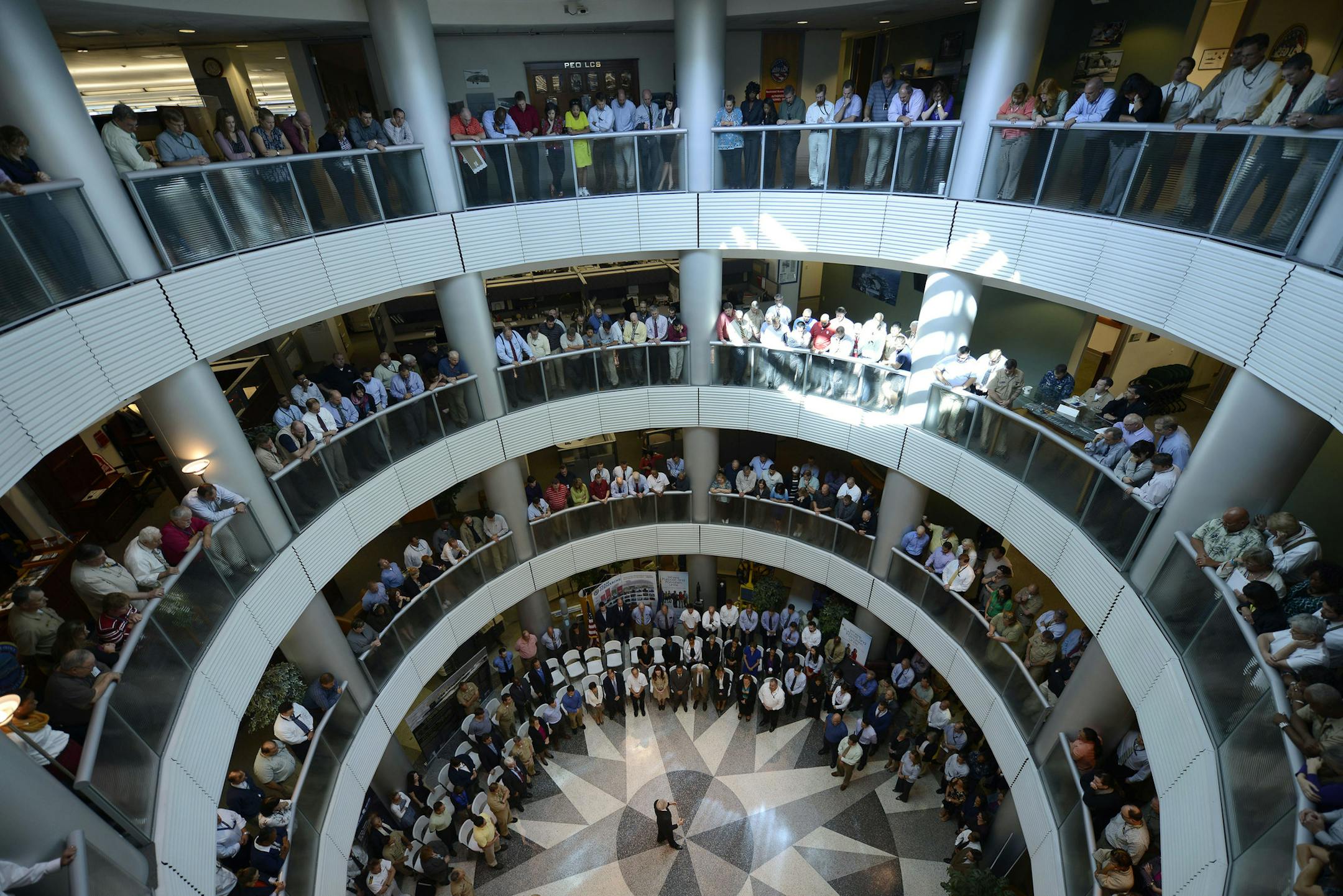 Secretary of the Navy Ray Mabus speaks to personnel on Thursday at the Washington Navy Yard during their first day back to work.