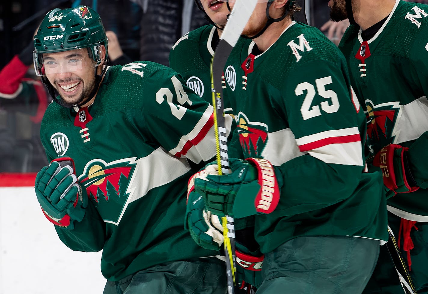 Matt Dumba celebrated with teammates after scoring a goal in the second period.