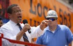 Minnesota Attorney General Keith Ellison spoke in front of dozens of union workers at the rally on Monday.