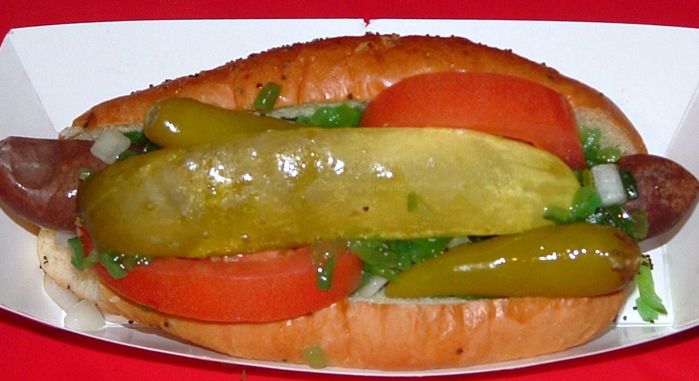 2014 State Fair new foods ; Bison Dog Hickory-smoked, gluten-free and made from naturally pasture-raised bison in River Falls, the Bison Dog can be served Chicago-style or with your choice of fixings on a gluten-free, poppy seed or plain bun. Find it at Chicago Dogs located in The Garden on the corner of Dan Patch Ave. and Underwood St. ORG XMIT: MIN1406251710094208