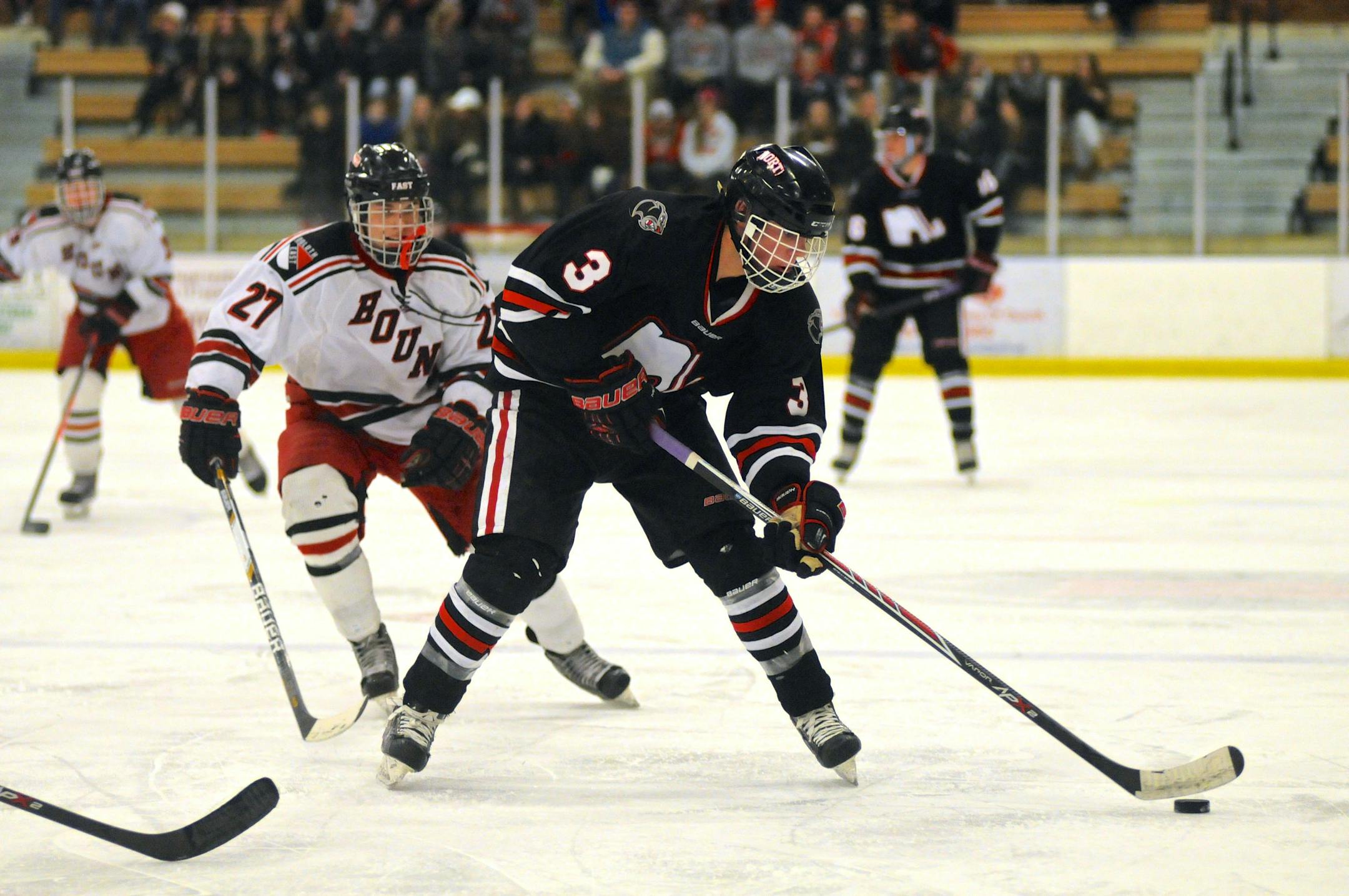 Lakeville North's Jack Poehling (above) and his brother Nate plan to play college hockey for St. Cloud State.