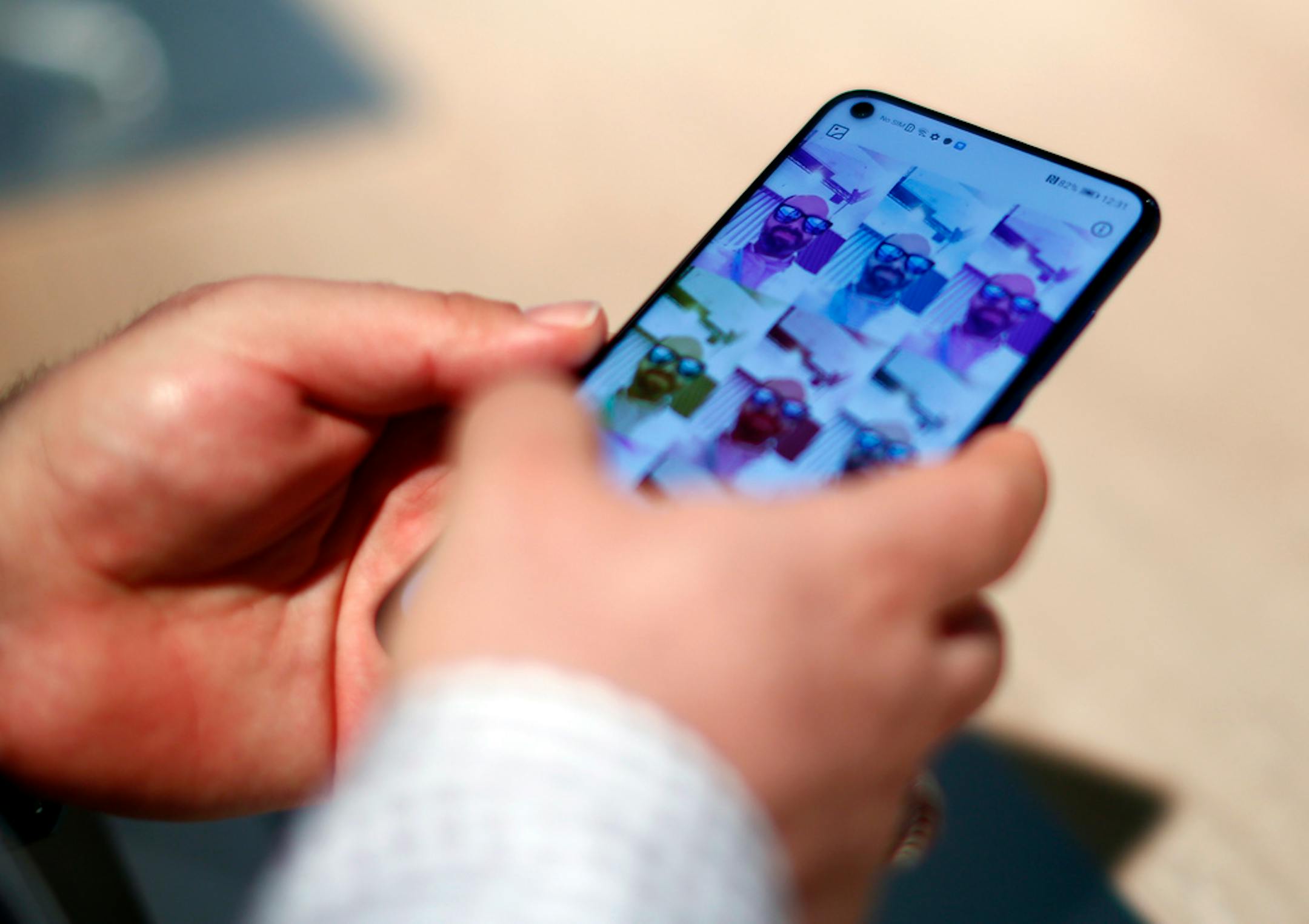 A visitor holds the new Samsung Galaxy S10 5G during the Mobile World Congress wireless show, in Barcelona, Spain, Monday, Feb. 25, 2019. The annual Mobile World Congress (MWC) runs from 25-28 February in Barcelona, where companies from all over the world gather to share new products. (AP Photo/Manu Fernandez) ORG XMIT: MF108