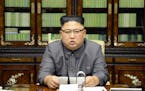 In this Thursday, Sept. 21, 2017, photo distributed on Friday, Sept. 22, 2017, by the North Korean government, North Korean leader Kim Jong Un deliver