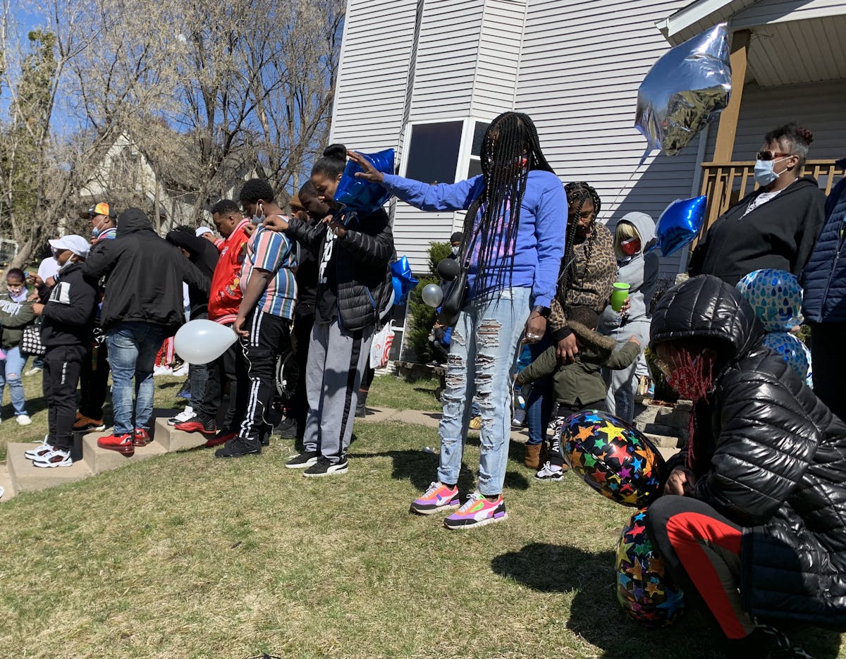 People mourned the loss of shooting victim Kevin Beasley in Minneapolis on Sunday, April 19, 2020. Beasley was shot to death at a house party in Minne