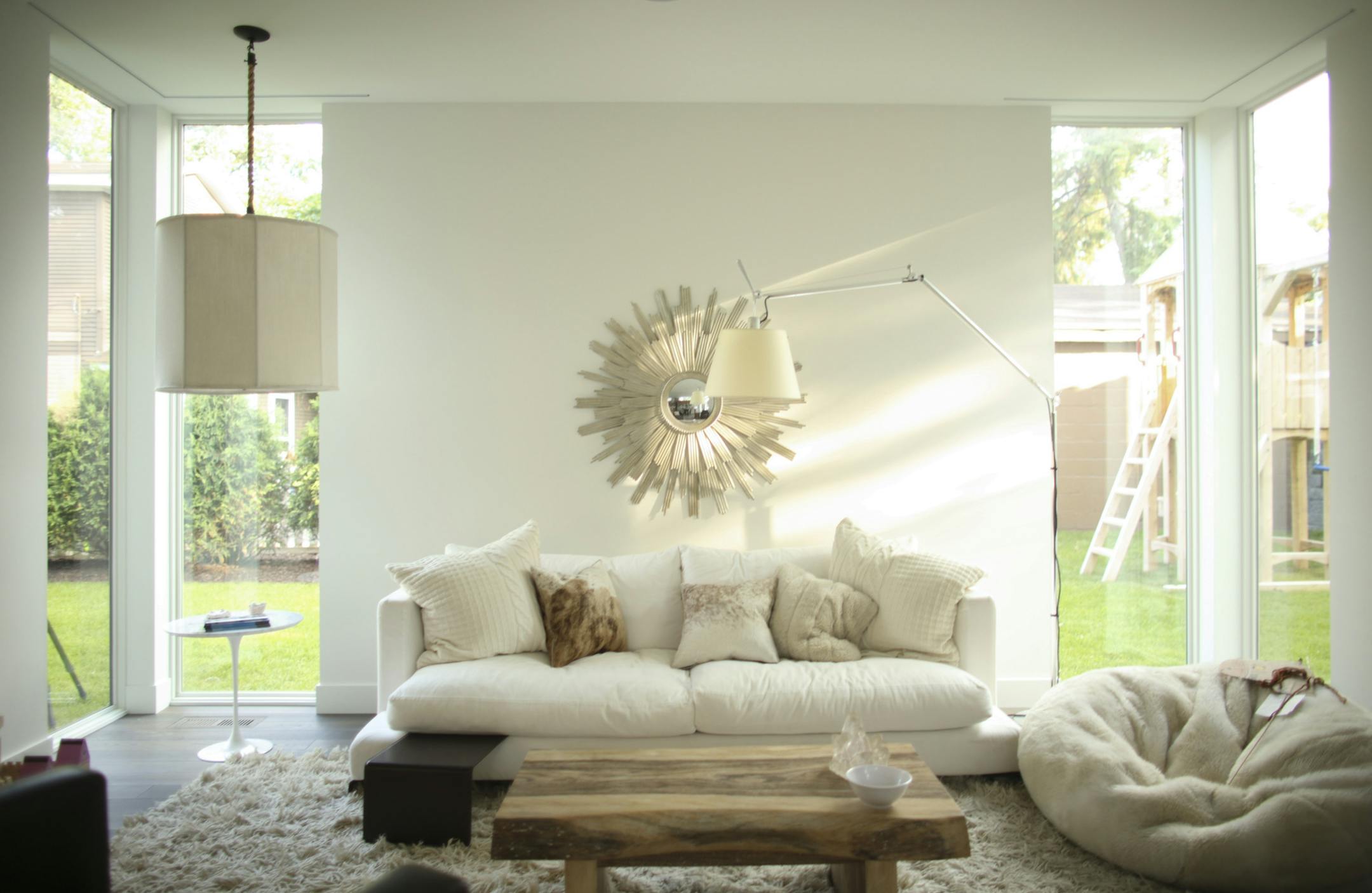 The living room Thursday evening. JEFF WHEELER ï jeff.wheeler@startribune.com Philip and Gayle Malcolm worked closely with Christian Dean Architecture to design a carefully scaled and sited modern home that mixes wood, concrete and steel while fitting in with the older homes in their urban neighborhood. They were photographed Thursday evening, June 18 2015 in Minneapolis.