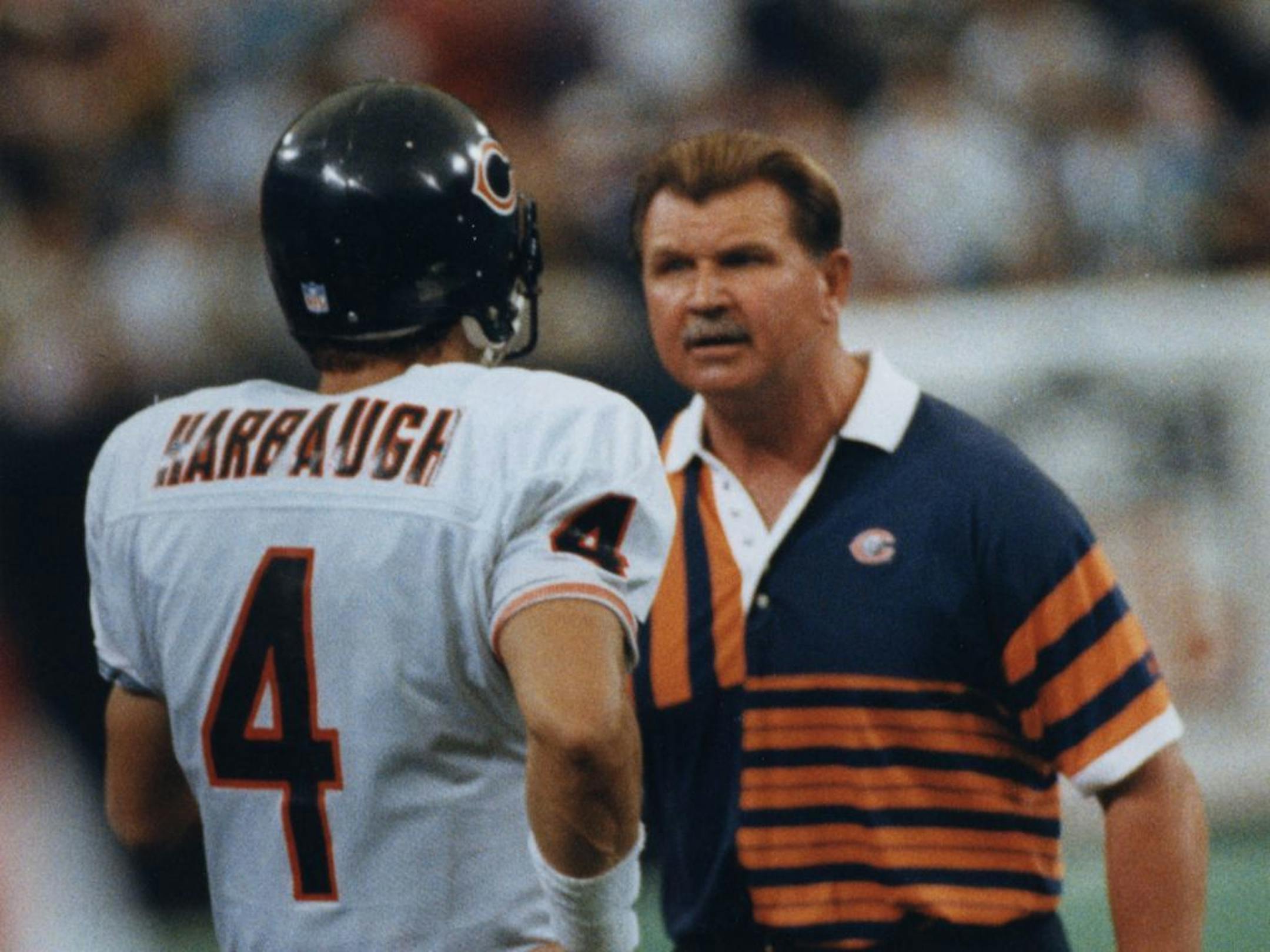 Chicago Bears coach Mike Ditka had a few choice words for QB Jim Harbaugh after his fourth-quarter interception was returned for a TD on Oct. 4, 1992.