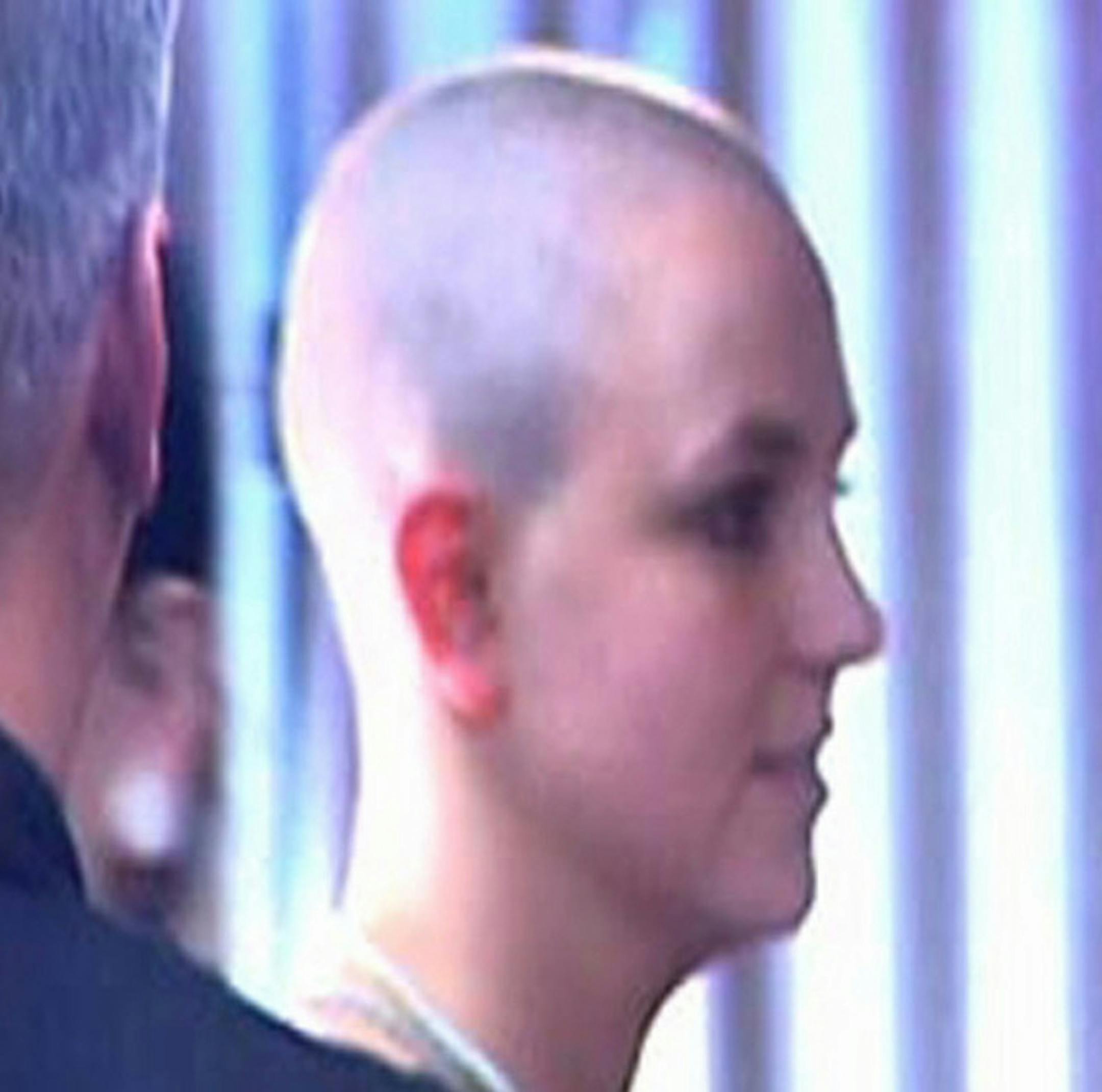 ** FOR USE WITH AP WEEKLY FEATURES ** In this photo made from video provided by KABC-TV, Pop singer Britney Spears is at a Sherman Oaks, Calif., tattoo parlor Friday night, Feb. 16, 2007. Spears was there to get a couple of tiny tattoos on her wrist, a pair of pink and red lips, according to KABC-TV. (AP Photo/KABC-TV) ** MANDATORY CREDIT ** ORG XMIT: NY677