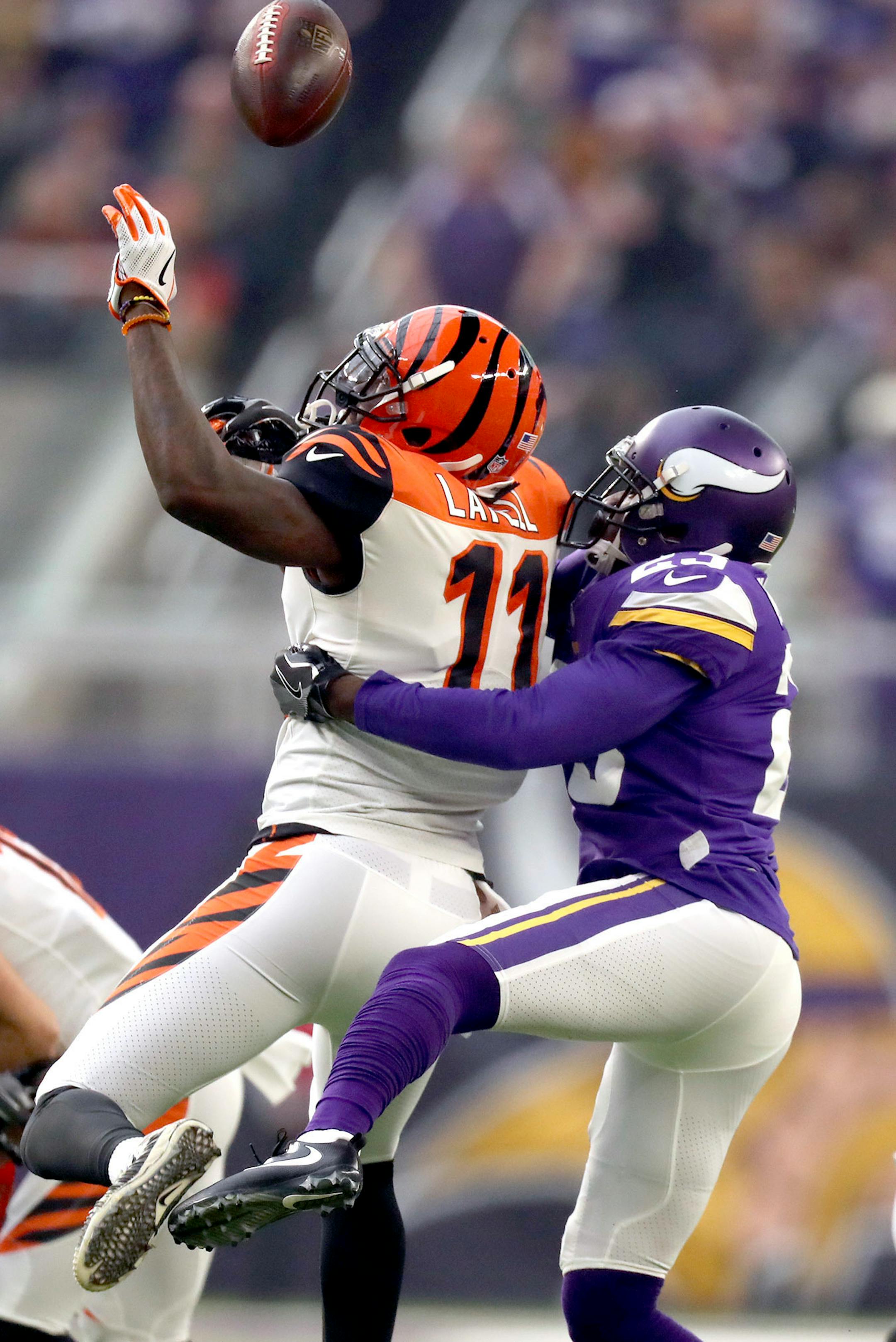 Vikings cornerback Terence Newman (23) broke up a pass intended for Cincinnati Bengals wide receiver Brandon LaFell in the first half. The Vikings defense held the Bengals to 42 yards of offense in the first half on the way to a 24-0 lead.
