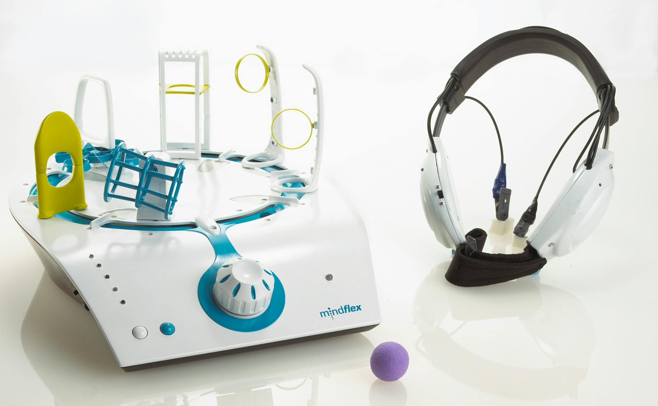 This undated photo provided by Mattel Inc., shows Mattel's new toy, Mind Flex. This toy comes with a brain-scanning head set. Concentrate, and a fan spins up to levitate a ball. Relax your thoughts, and the ball descends. For a challenge, guide the ball through an "obstacle course" of hoops. May the Force be with you when the Mind Flex hits stores in the fall for $80.