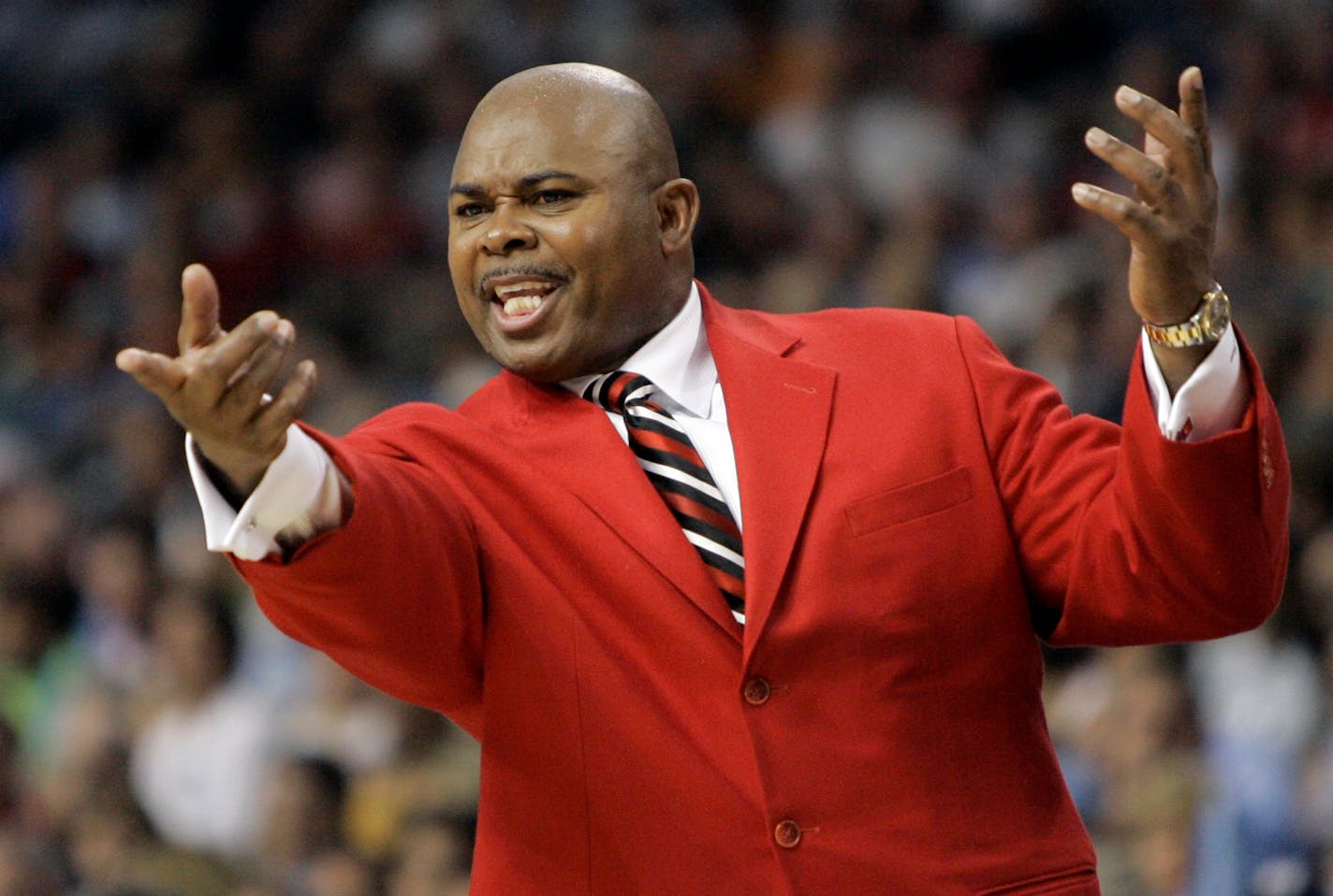 North Carolina State head coach Sidney Lowe shouts to his players during the second half of the championship game against North Carolina in the Men's Atlantic Coast Conference basketball tournament in Tampa, Fla., Sunday, March 11, 2007. (AP Photo/David J. Phillip)