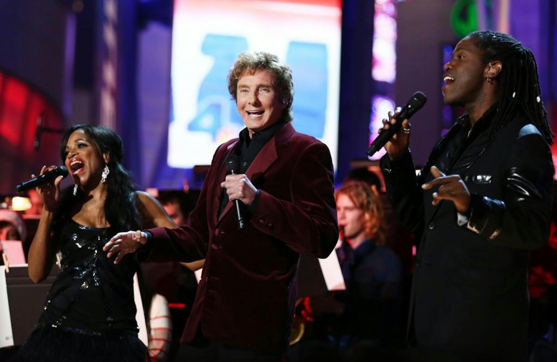 Barry Manilow performs at the 5th annual Holiday Tree Lighting at L.A. Live and opening of LA Kings Holiday Ice on Wednesday, Nov. 28, 2012, in Los Angeles.