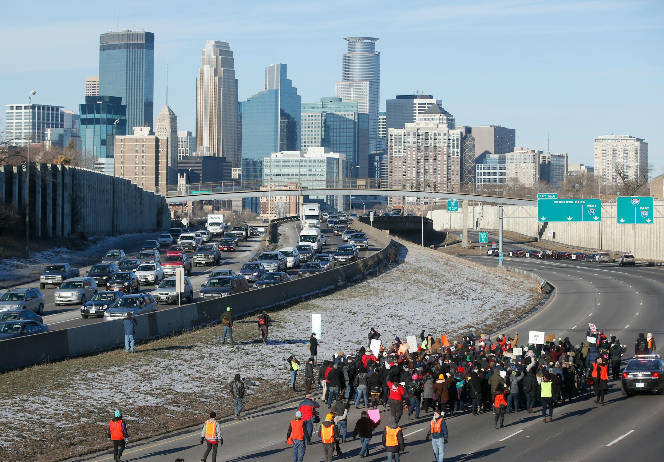 Protesters in Minneapolis MN, shutdown the northbound lanes of I-35W December 4th, 2014, a day after a grand jury declined to indict NYPD Officer in the chokehold death of Eric Garner.