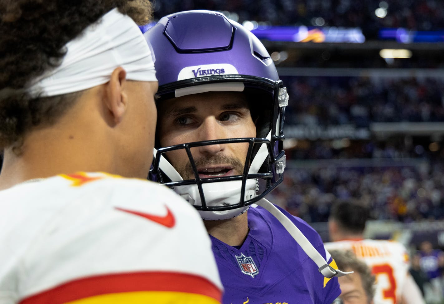 Kansas City Chiefs quarterback Patrick Mahomes (15) and Minnesota Vikings quarterback Kirk Cousins (8) chat at the end of the game Sunday, October 8, 2023, at U.S. Bank Stadium in Minneapolis, Minn. ] CARLOS GONZALEZ • carlos.gonzalez@startribune.com