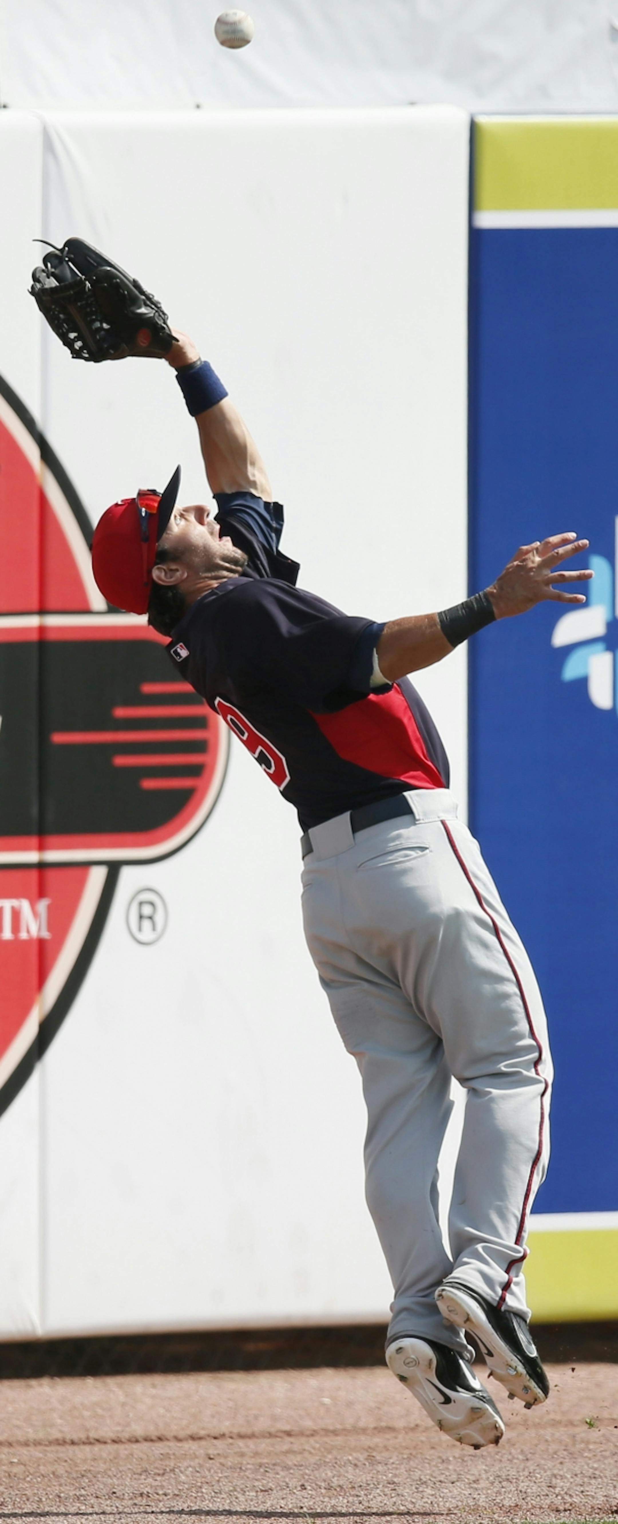 Darin Mastroianni caught a ball in the right field hit by Toronto's Emilio Bonifacio in the second inning during the Twins and Blue Jays spring game Tuesday Feb.26, 2013 at Florida Auto Exchange Stadium in Dunedin , FL. Minnesota beat Toronto 8-4