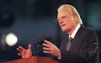 The Rev. Billy Graham speaks at one of his Crusades.