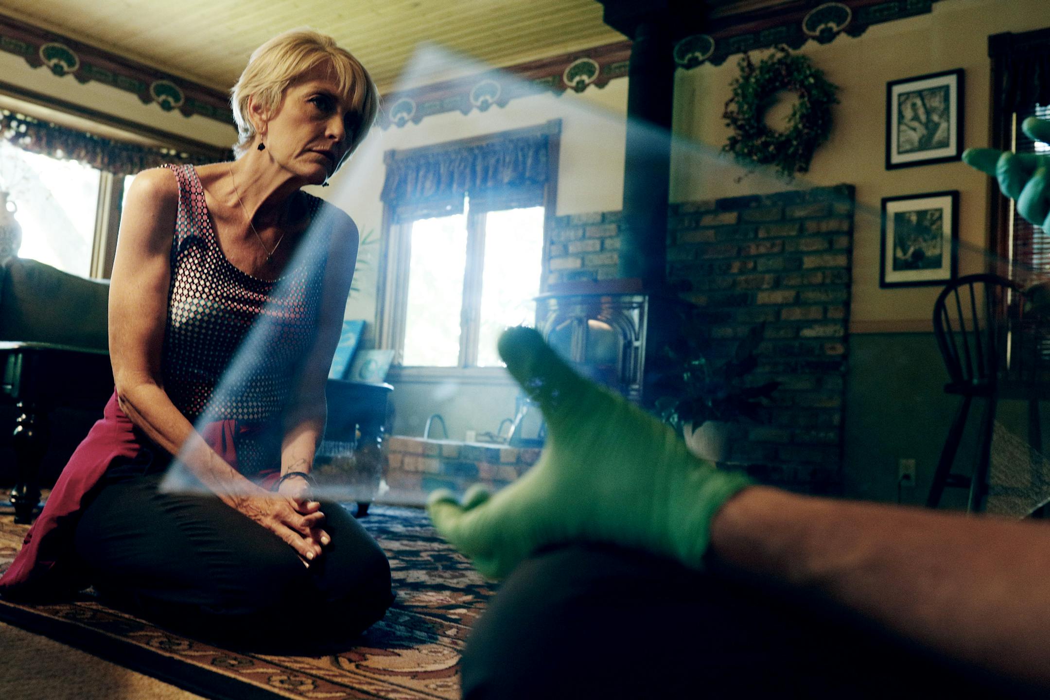 St. Paul police officer Mark Lundquist left, explained to Shari Wagner the finger printing process as he removed a glass panel form a cabinet at the home of Shari and Eric Wagner July 2, 2018 in Mendota Heights, MN. The Wagnerís one and half year old grandson Abraham Flynnís died in a tragic accident last April. His grandmother shorty discovered his left hand print after his death. Shari Wagner said that she would use his fingerprint for a possible jewelry piece. ] JERRY HOLT ï je