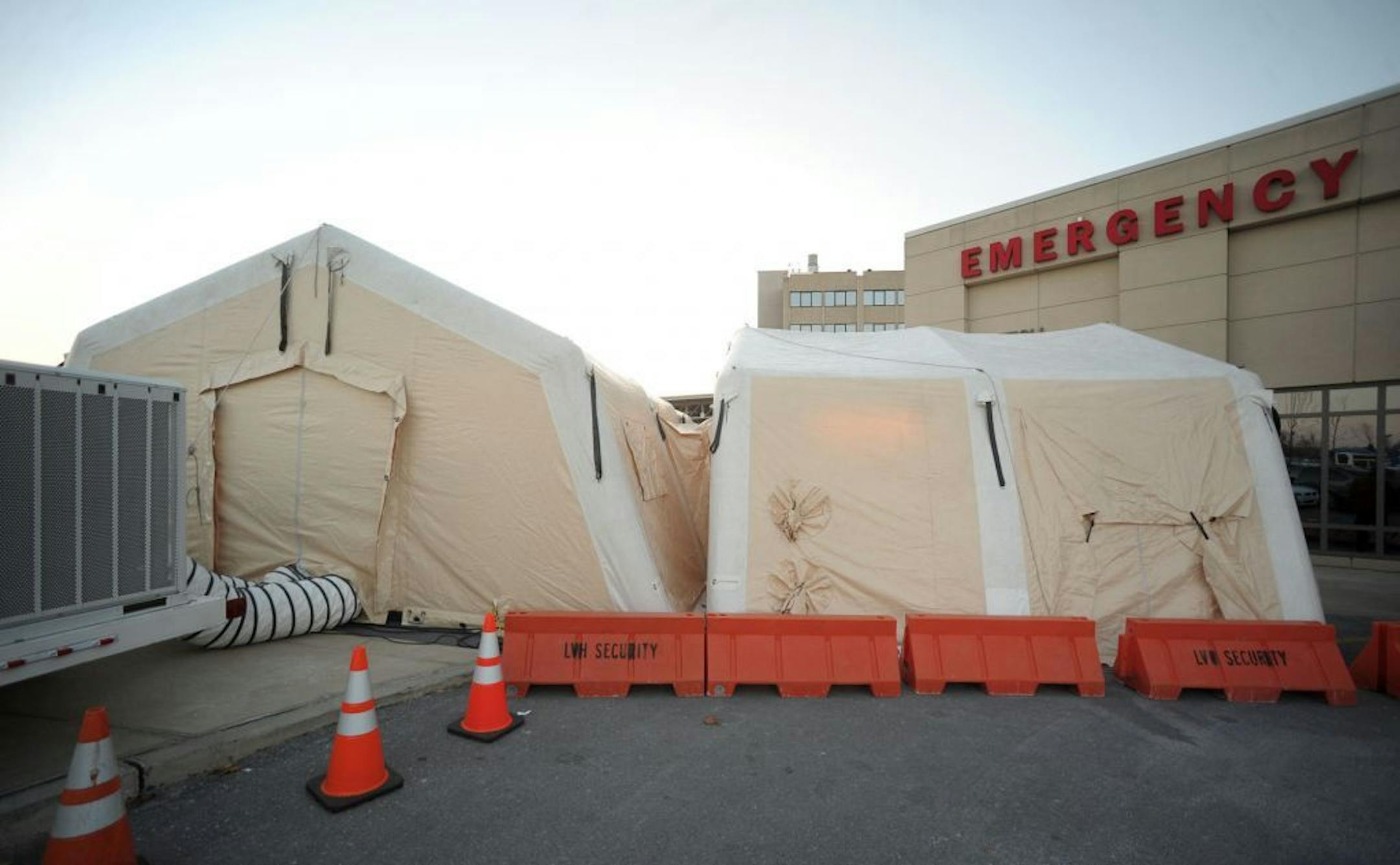 A tent is set up to see flu patients outside of the Emergency Room at Lehigh Valley Hospital on Monday, Jan. 7, 2013 at Cedar Crest, in Salisbury Township, Pa. The tent was set up after cases were piling up at the Salisbury Township hospital Monday, with the hospital reporting an extremely busy flu season so far.