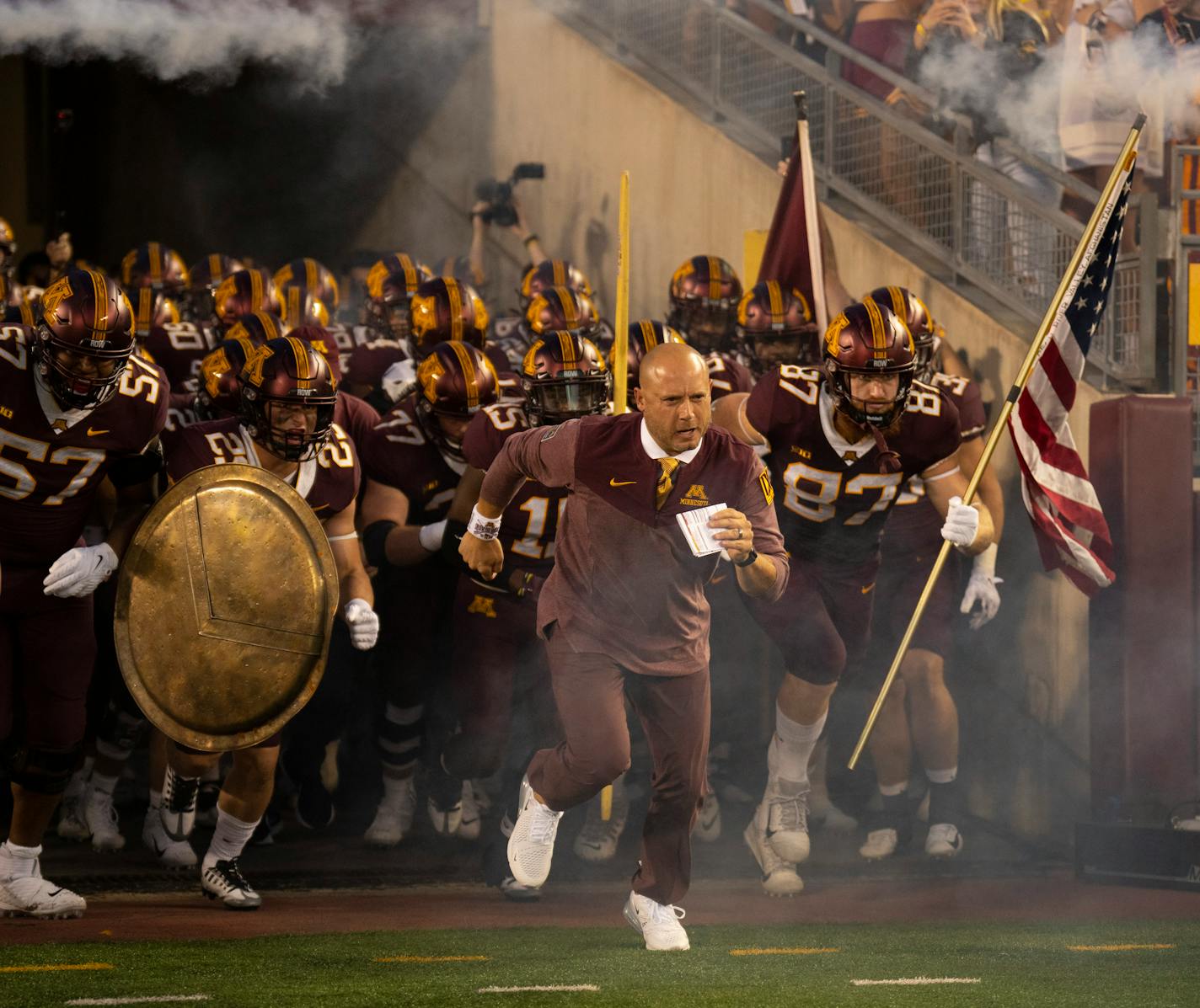 Gophers head coach P.J. Fleck led the team onto the field at Huntington Bank Stadium on Thursday night