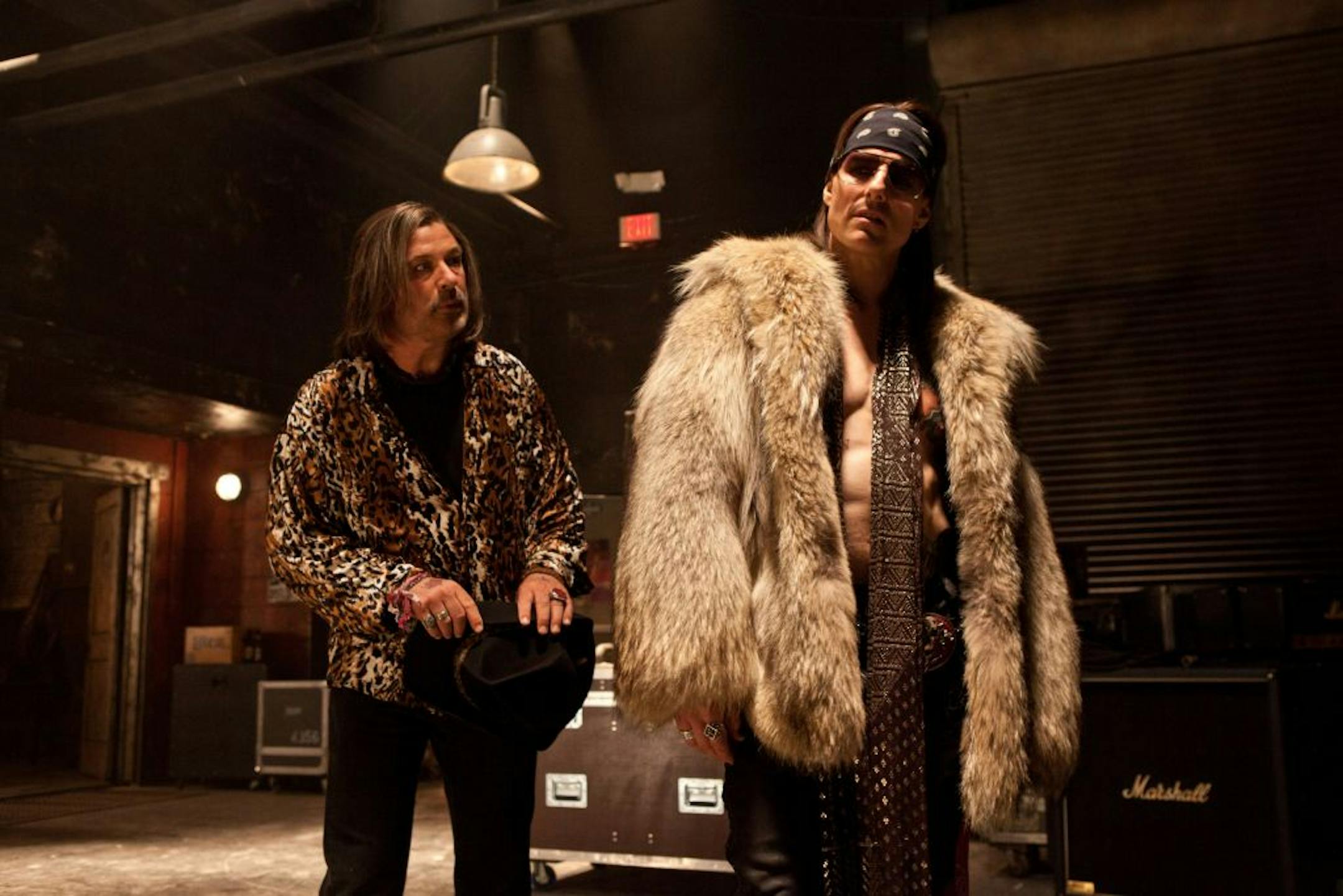 Alec Baldwin as Dennis Dupree, left, and Tom Cruise as Stacee Jaxx in "Rock of Ages."
