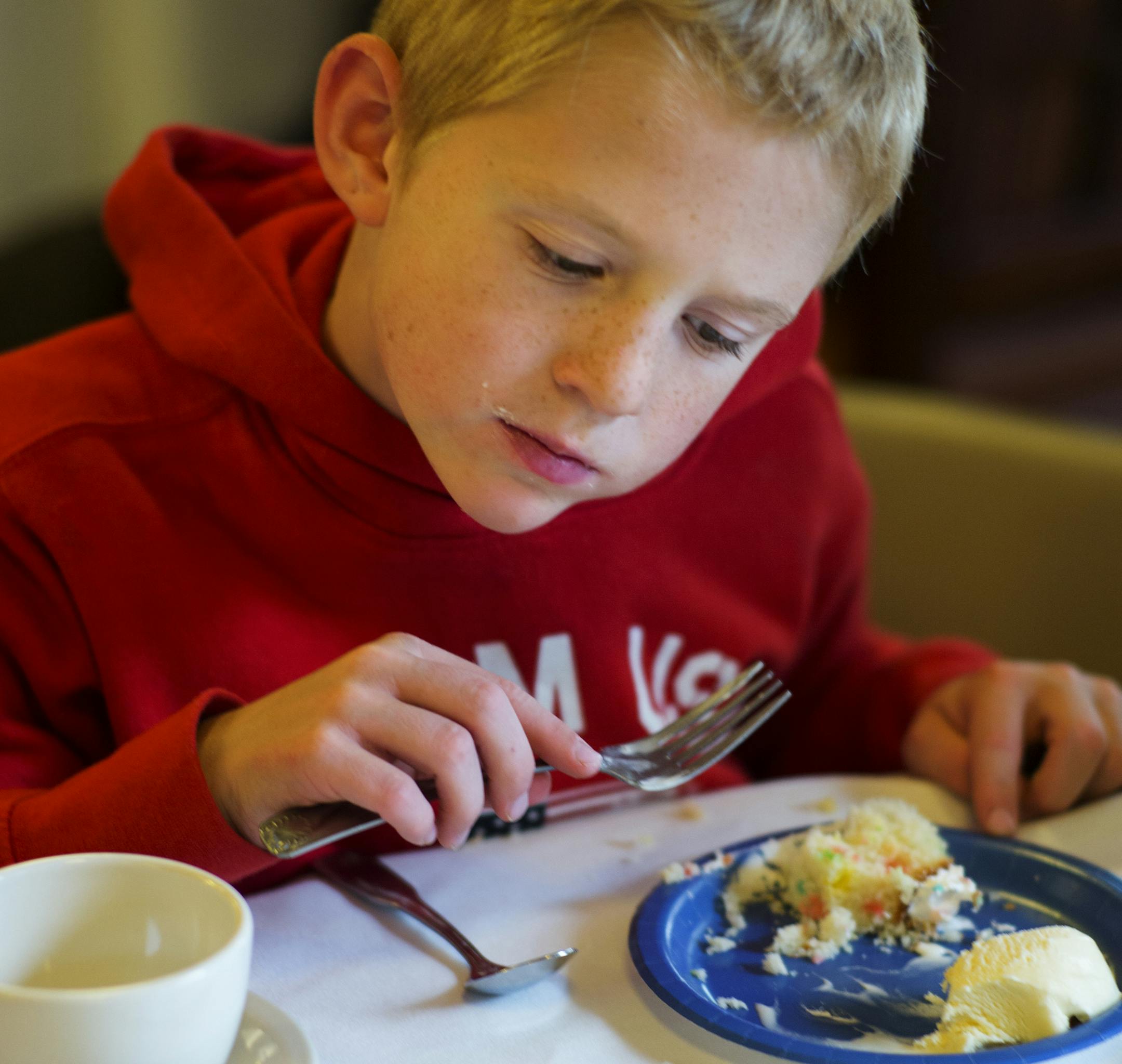Erik Dahl,7, who attends church with Anna Stoehr read up on a history of "Anna's Era" which began on October 15, 1900, the year before Teddy Roosevelt became president. This past September, she joined the World Wide Web and started using an Ipad.