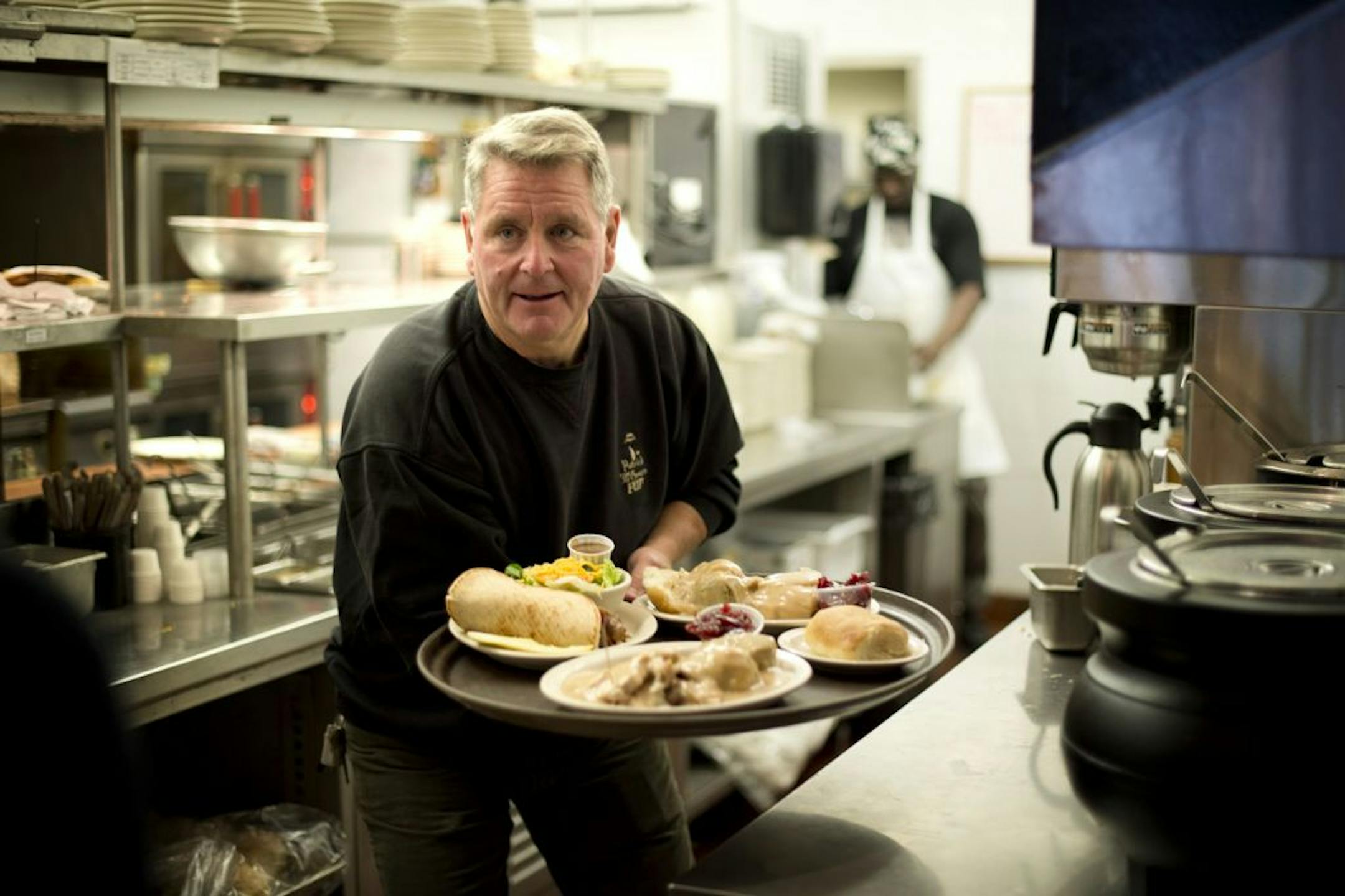 Pat Boemer, owner of Patrick McGovern's Pub, hustled meals at lunchtime. McGovern's, a short stroll down the street from Xcel Energy Center, would just as soon not lose the business generated by the Wild.