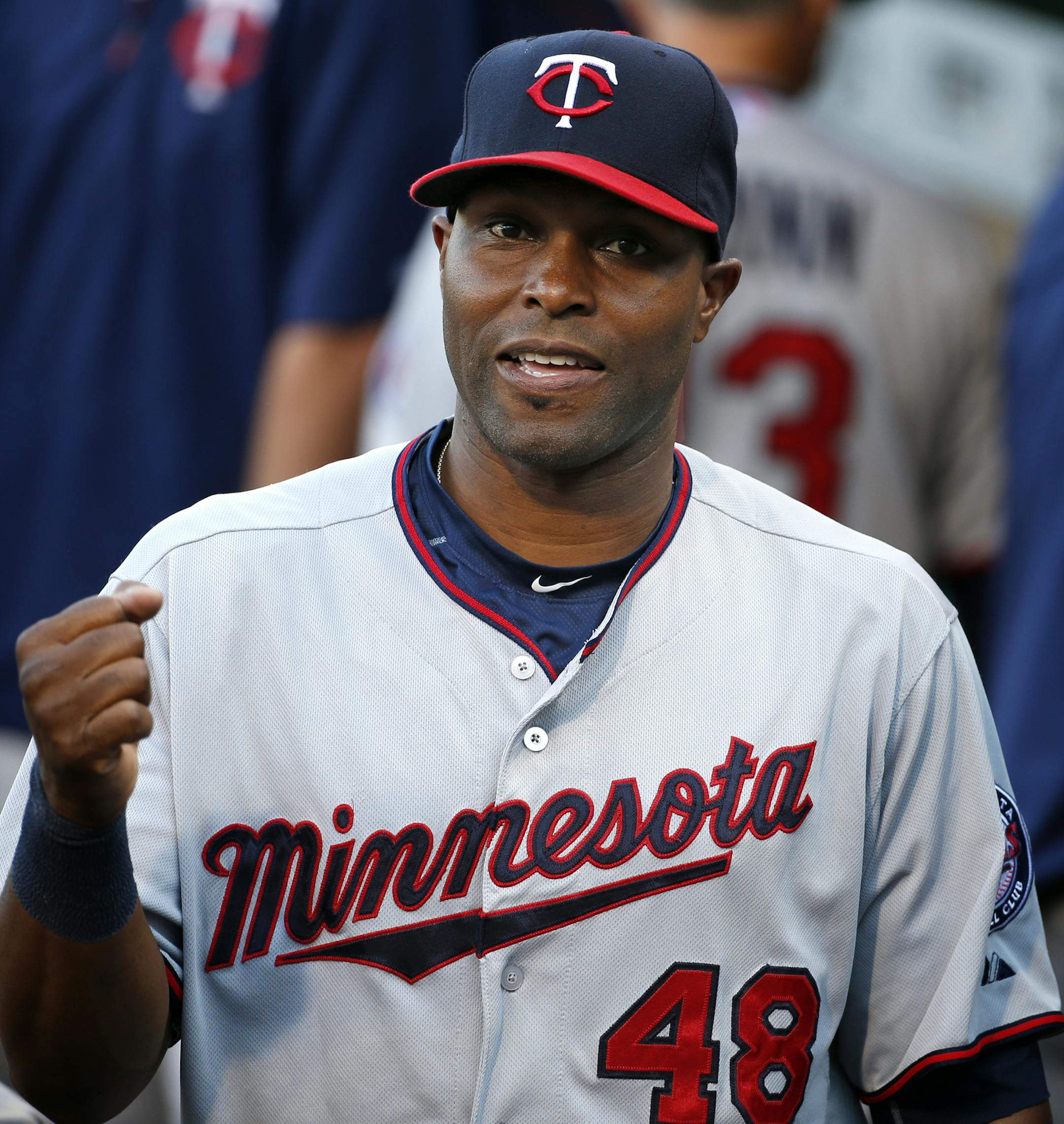Minnesota Twins' Torii Hunter (48) walks through the dugout before a baseball game against the Pittsburgh Pirates in Pittsburgh Tuesday, May 19, 2015.(AP Photo/Gene J. Puskar)