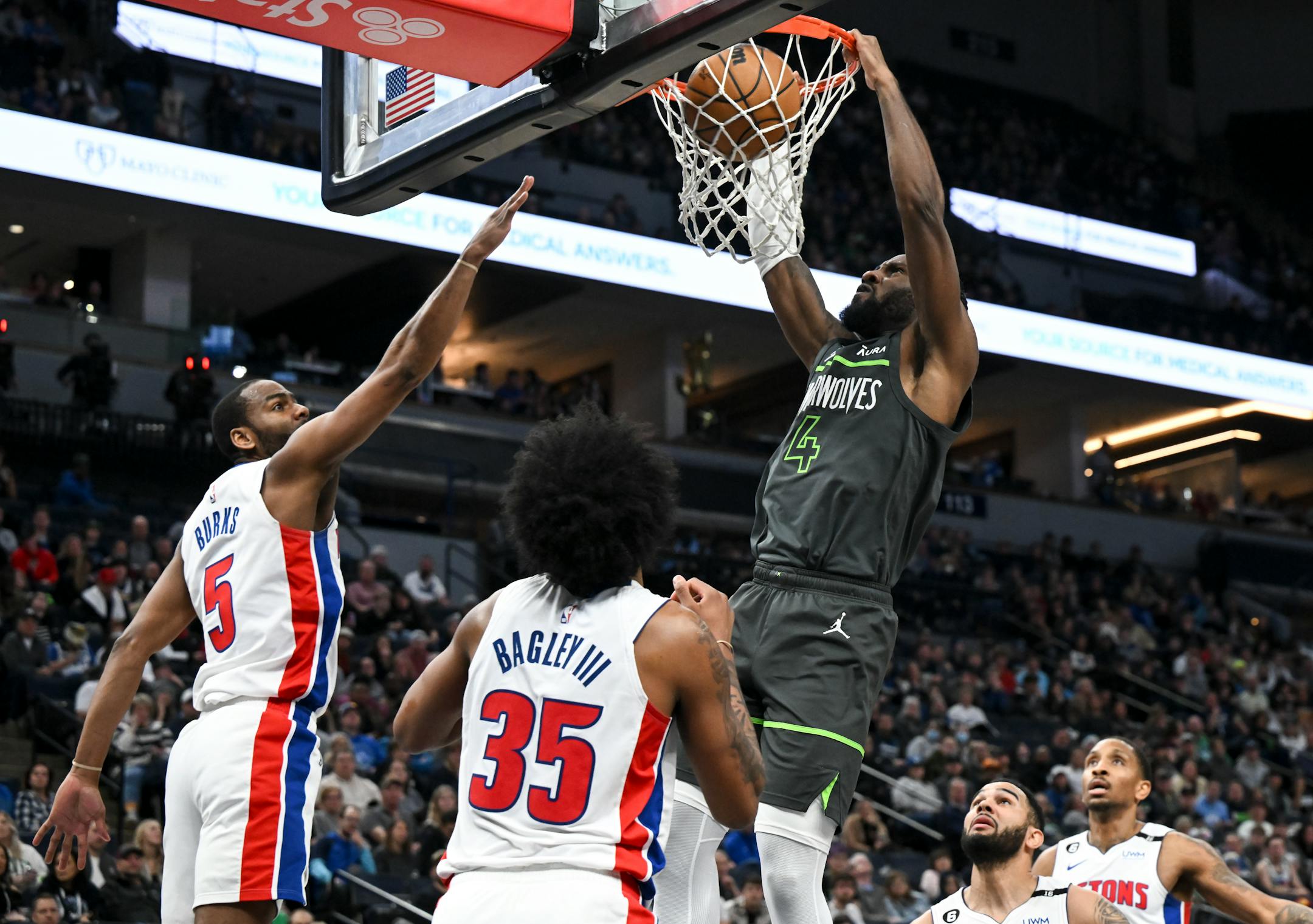 Minnesota Timberwolves guard Jaylen Nowell (4) dunks the ball against the Detroit Pistons during the second half.