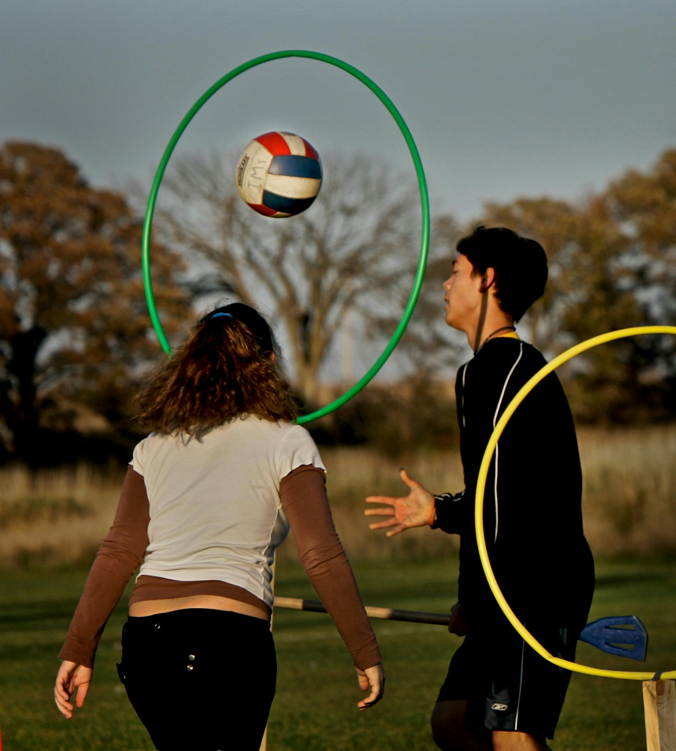 Kiyota Gom, 4th Burton, flips the ball through the goal as referee Brianne Wooldridge watches.