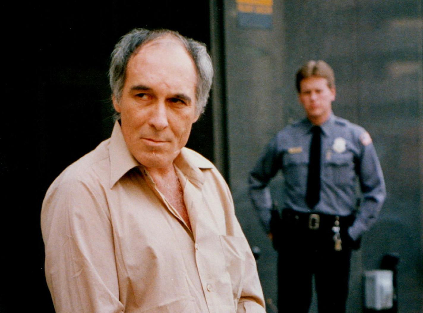 Billy Glaze, pictured in a 1988 file photo, walks out of the Federal building in Minneapolis.