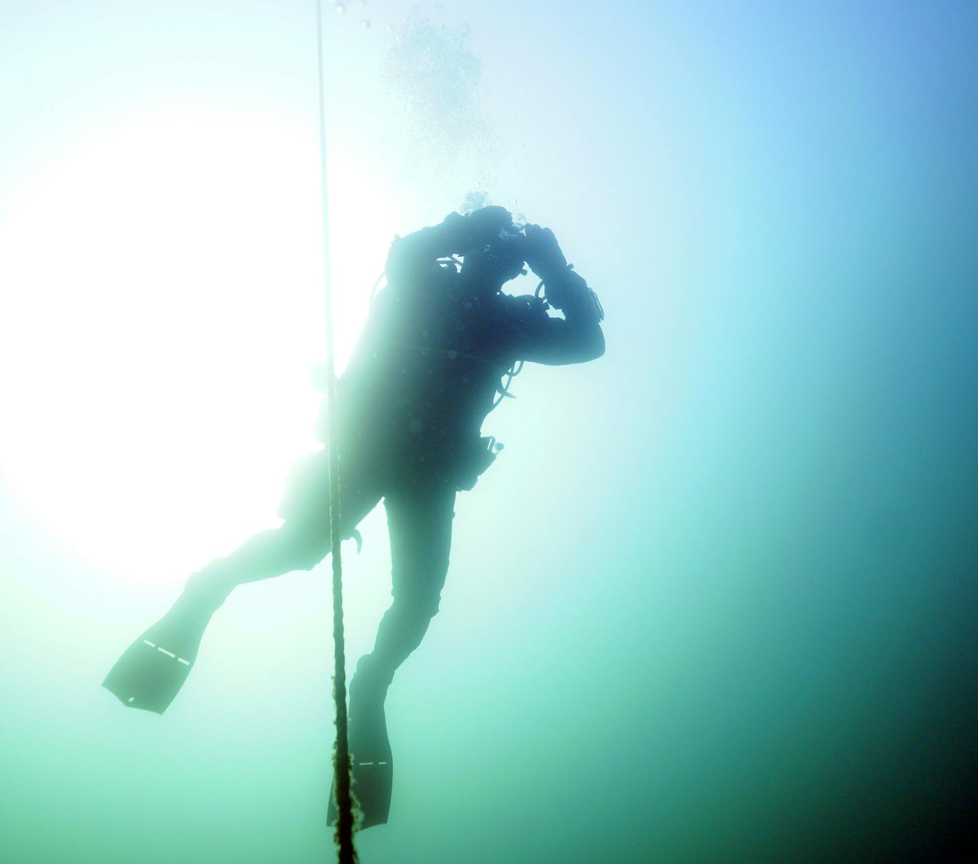 Jack Decker, a diver with the Great Lakes Shipwreck Preservation Society from Clear Lake, Iowa, cleared his mask as he followed the decent line down to the Hesper. ] ANTHONY SOUFFLE &#x2022; anthony.souffle@startribune.com The scuba divers of the Great Lakes Shipwreck Preservation Society dove the two most accessible shipwrecks, the Hesper, a bulk-freighter steamship that sank in Lake Superior on May 4, 1905 off Silver Bay and the Madeira, a schooner barge that sank in Lake Superior on November