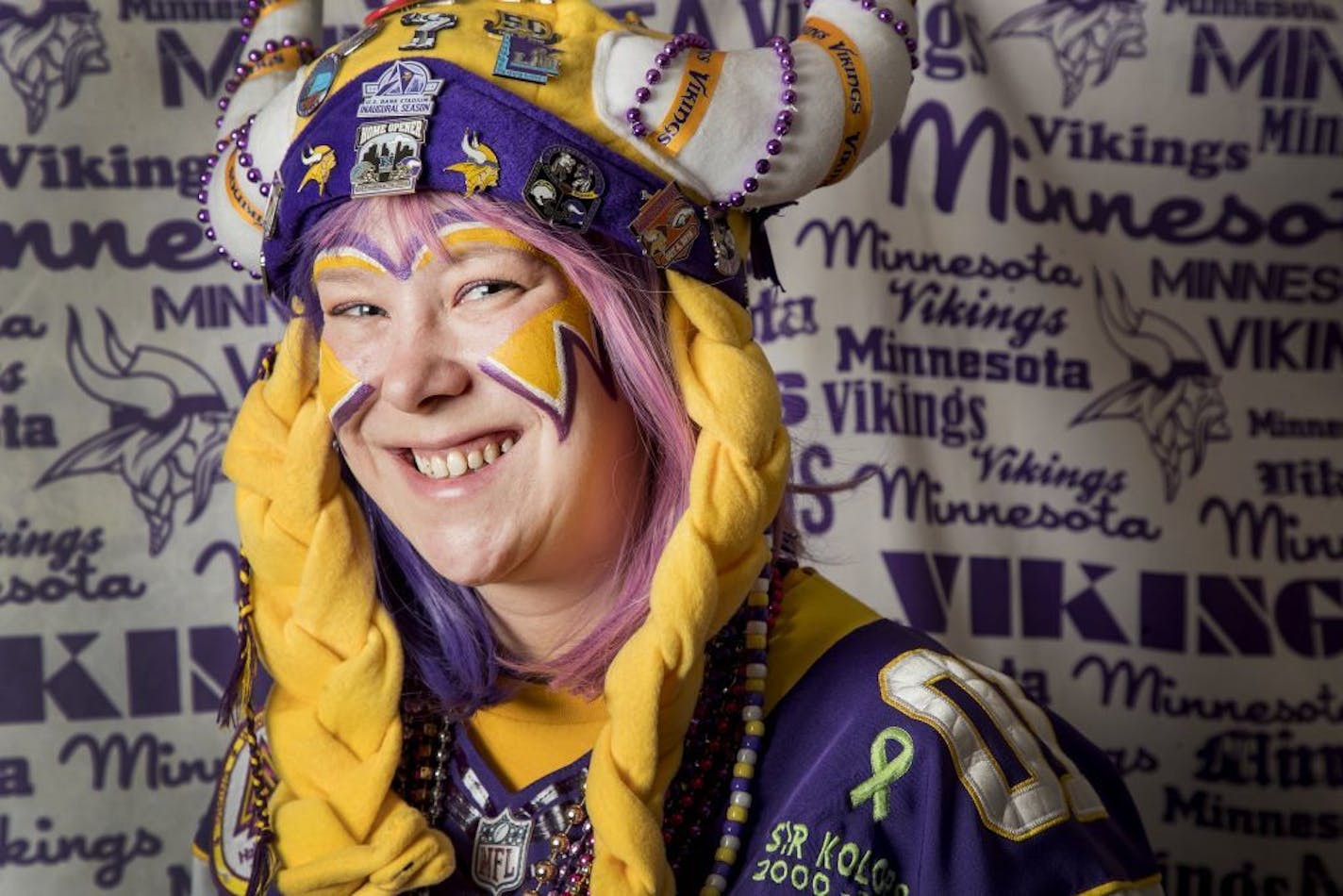 Minnesota Vikings super fan Lindsey "Purplelicious" Lorentson photographed with team memorabilia at her home in Rosemount, MN.