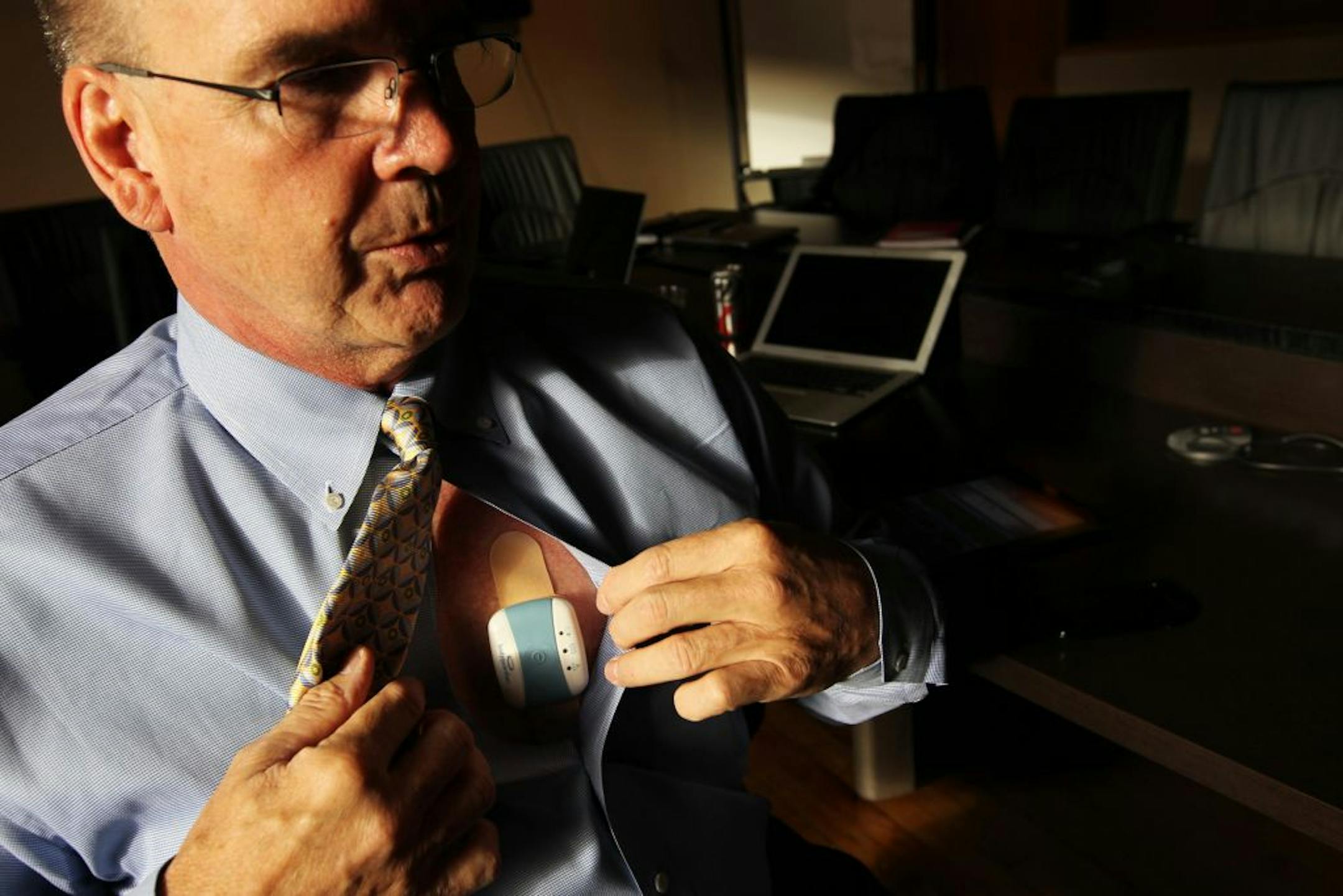 Medical Innovation Officer Dr. Drew Palin demonstrates the BodyGuardian Remote Monitoring System at Preventice in Minneapolis September 13, 2012.