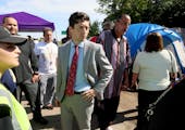 Minneapolis Mayor Jacob Frey visited a homeless encampment near the LIttle Earth housing project in 2018. Protesters who are angry about what they cal