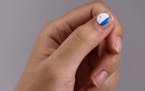New, smart UV sensors developed by Northwestern University scientists are so tiny they can be worn as stickers, jewelry - or even nail art.