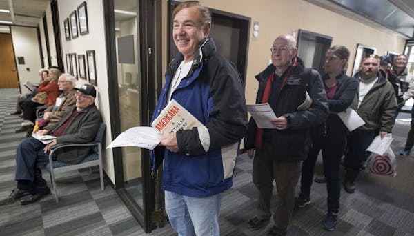 Joe Antonucci waited in line to pre-pay his 2018 property tax Wednesday December 27, 2017 in Minneapolis.