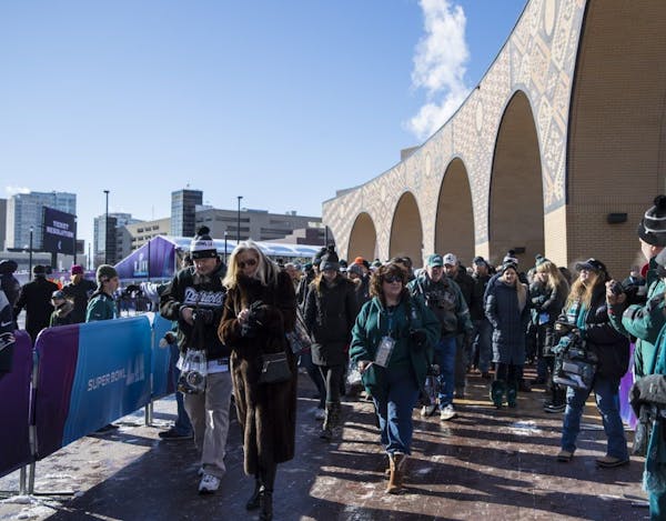 Crowds get off of Light Rail at U.S. Bank Stadium for Super Bowl LII on Sunday, February 4, 2018, in Minneapolis, Minn.
