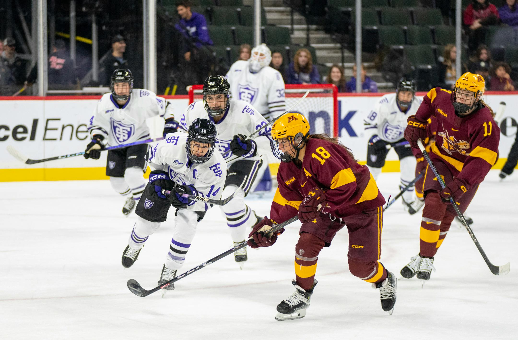 Minnesota forward Abbey Murphy (18) controls the puck against St. Thomas in the first period Friday, Oct. 13, 2023, at Xcel Energy Arena in St. Paul, Minn. ]