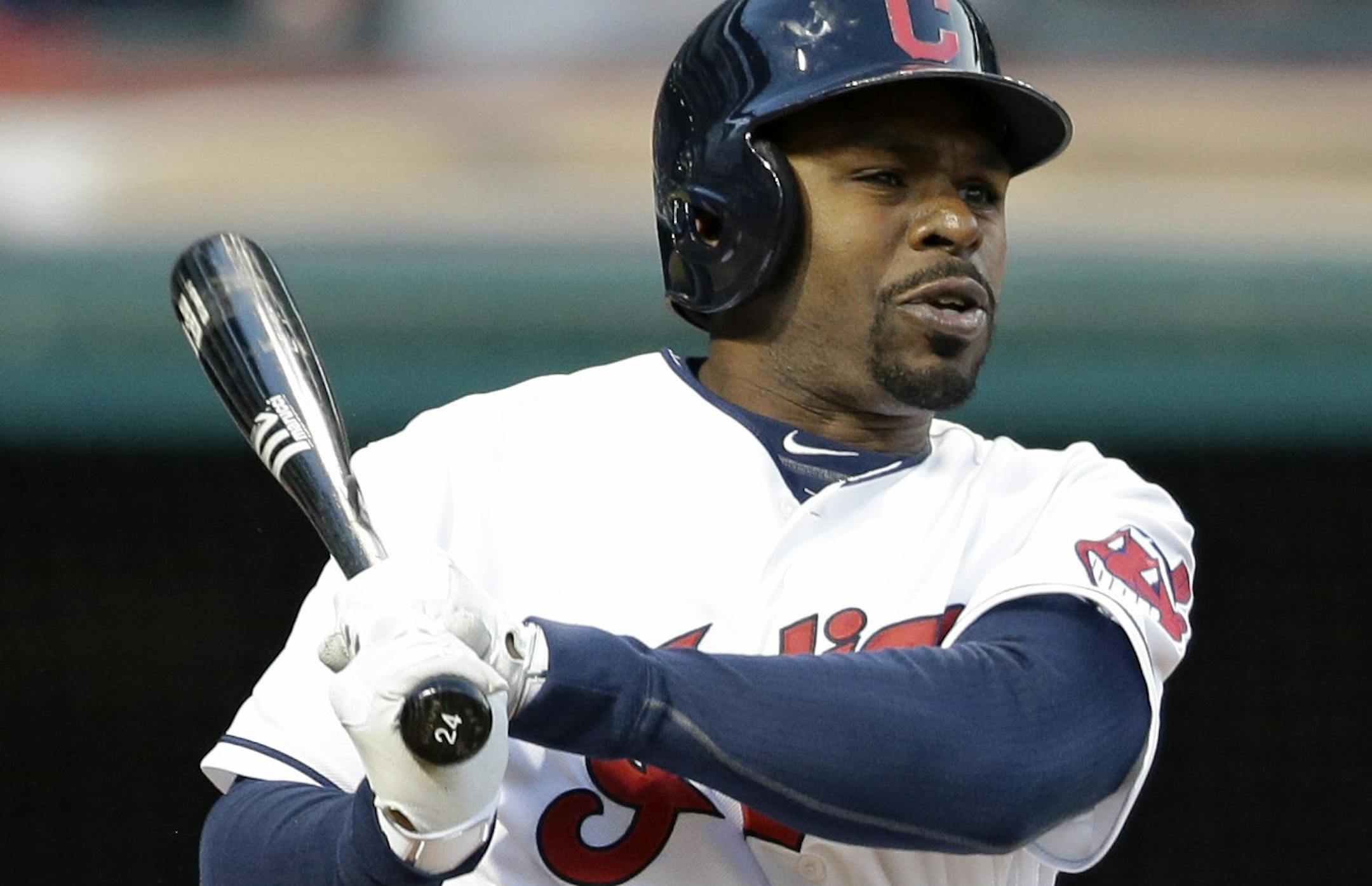 Cleveland Indians&#xed; Michael Bourn hits an RBI-double off Kansas City Royals relief pitcher Franklin Morales in the sixth inning of a baseball game, Wednesday, April 29, 2015, in Cleveland. (AP Photo/Tony Dejak) ORG XMIT: OHTD10