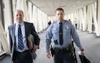 Minneapolis police officer Matthew Harrity leaves the courtroom for lunch break with his attorney Fred Bruno.