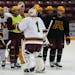 Gophers football coach PJ Fleck surprised the men's hockey team by donning goalie gear, complete with his own name and number, during practice. He gav