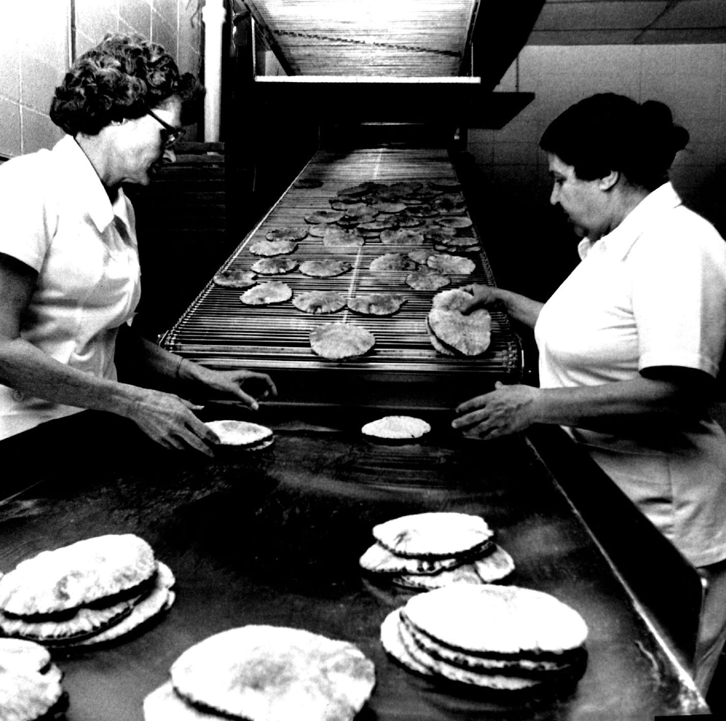 May 12, 1977 Lucille Cafferty, left, and Eva Leach took Lebanese pocket bread off the conveyor at the Middle East Bakery. May 11, 1977 Donald Black, Minneapolis Star Tribune